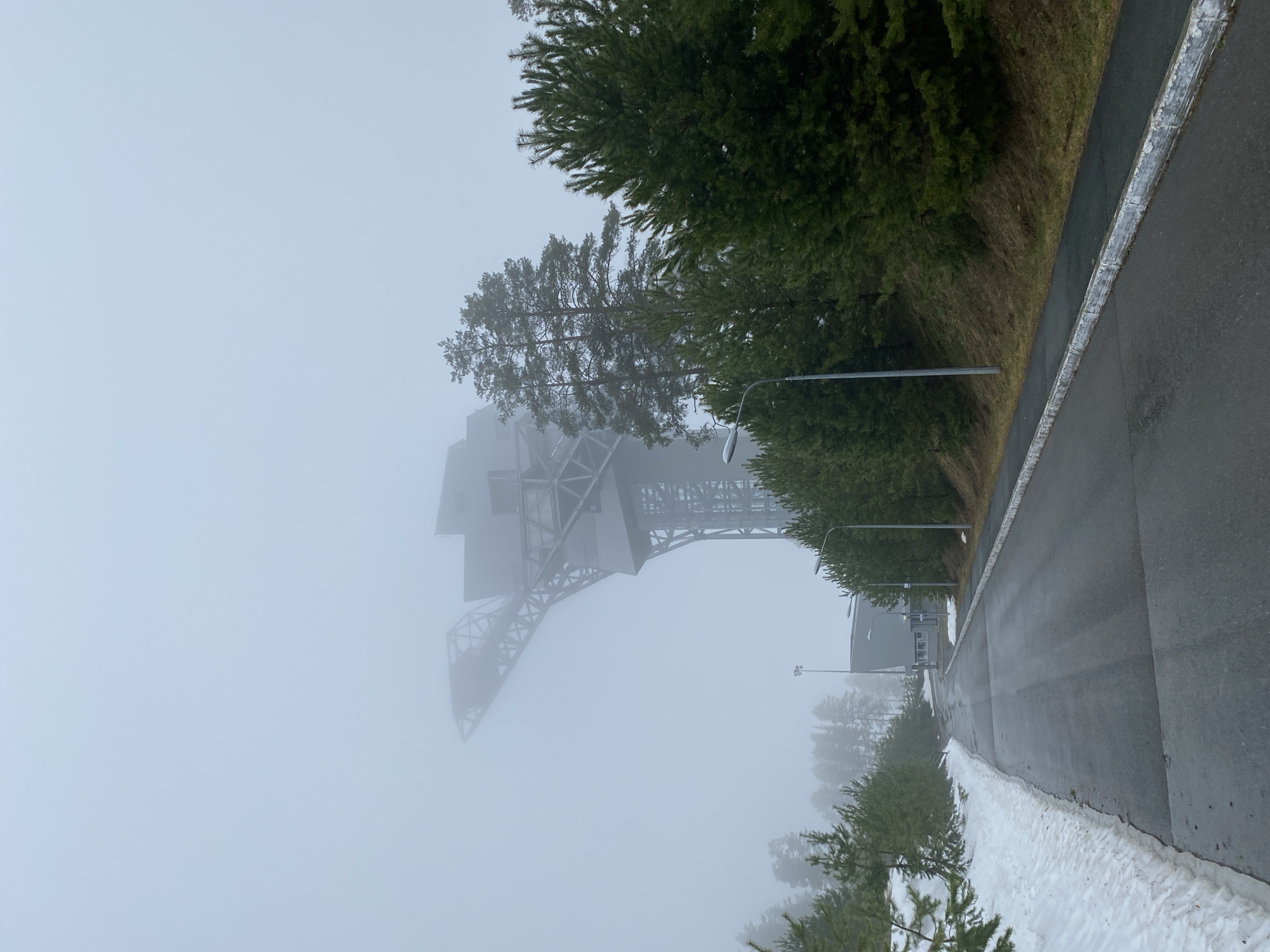 Morning fog shrouds industrial structure in Прикамский, Russia