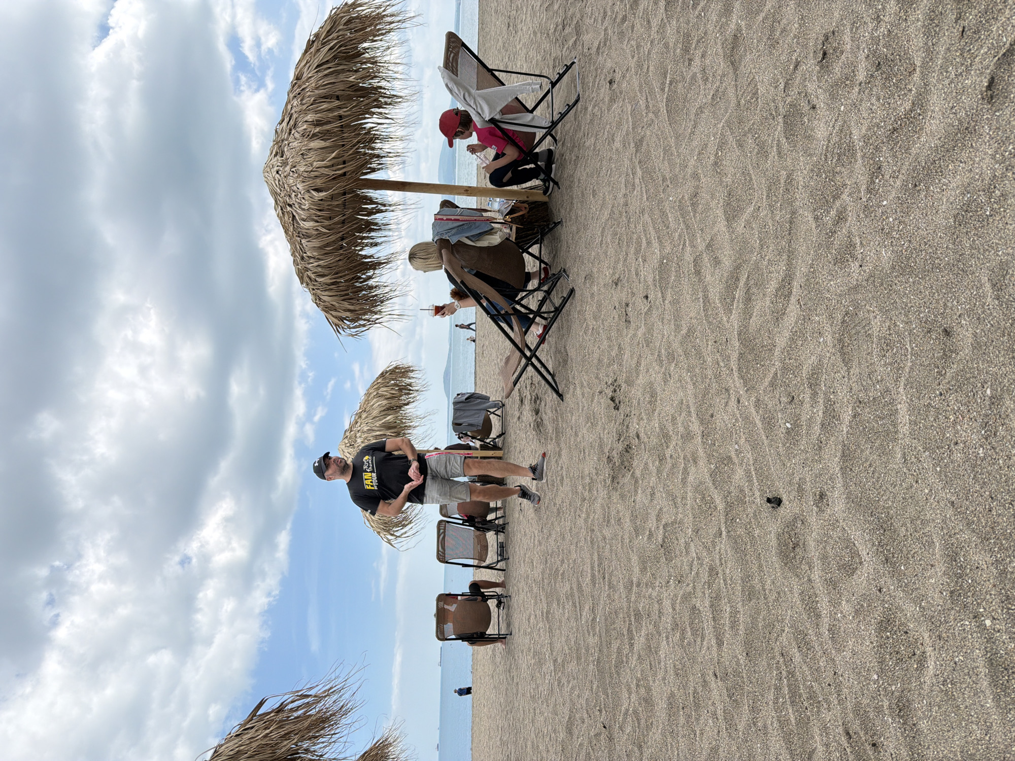 Weekend beach and street life documented at coastal location