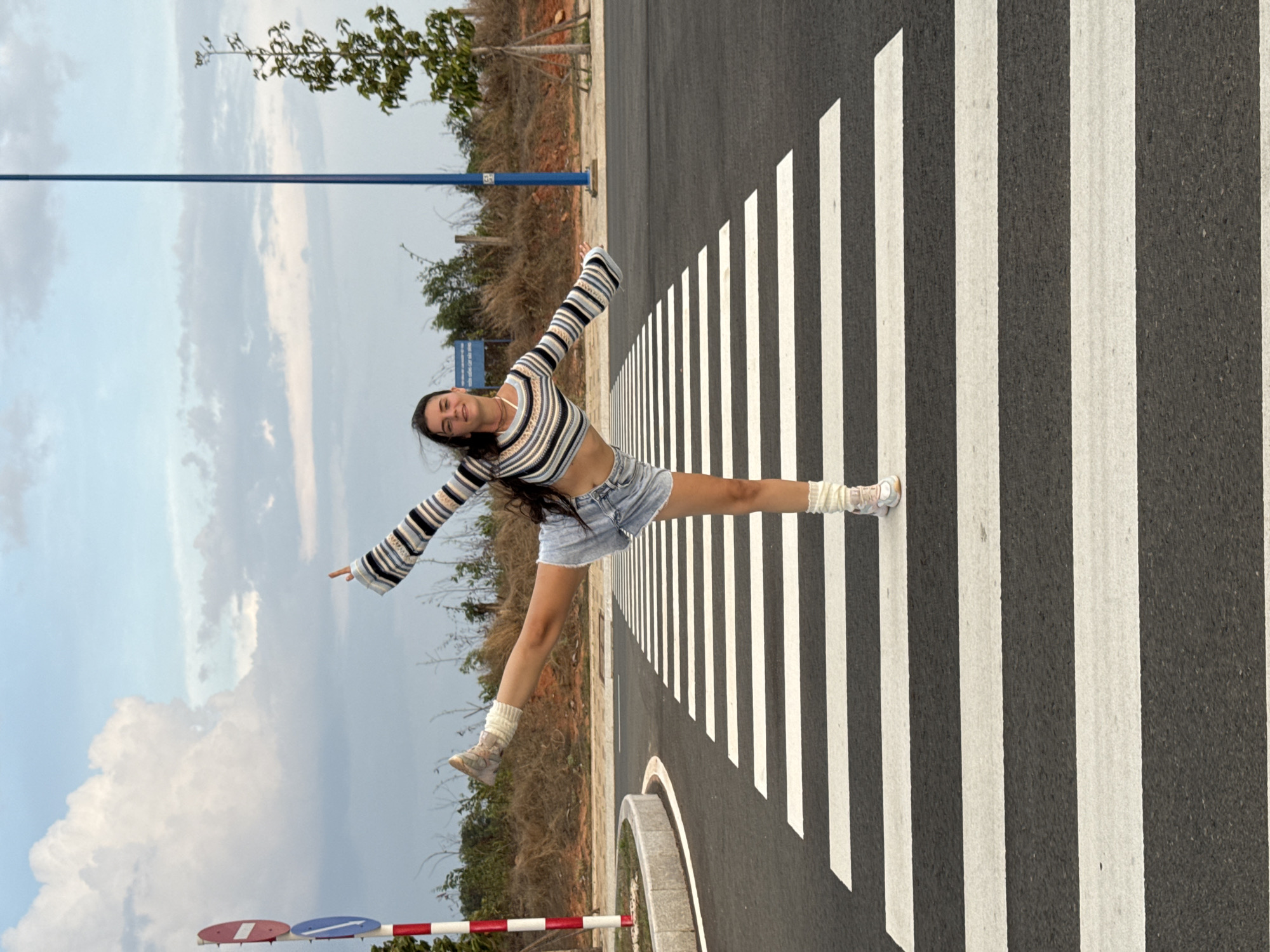 Woman poses on crosswalks during photo session in Mui Ne