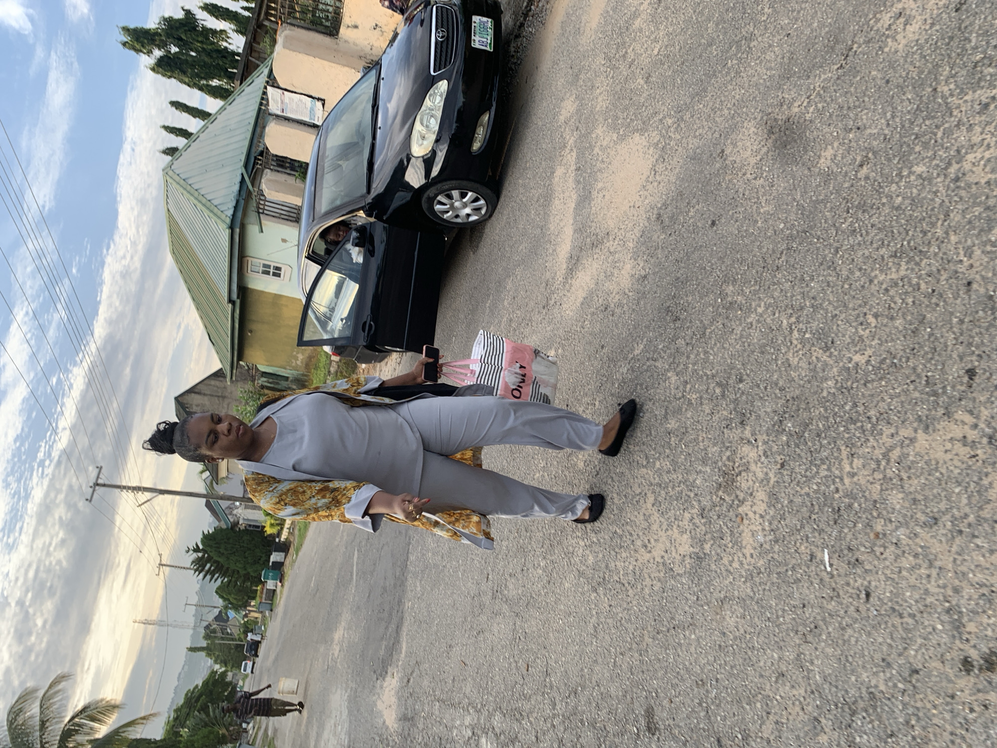 Morning street scenes and portraits in Abuja residential area