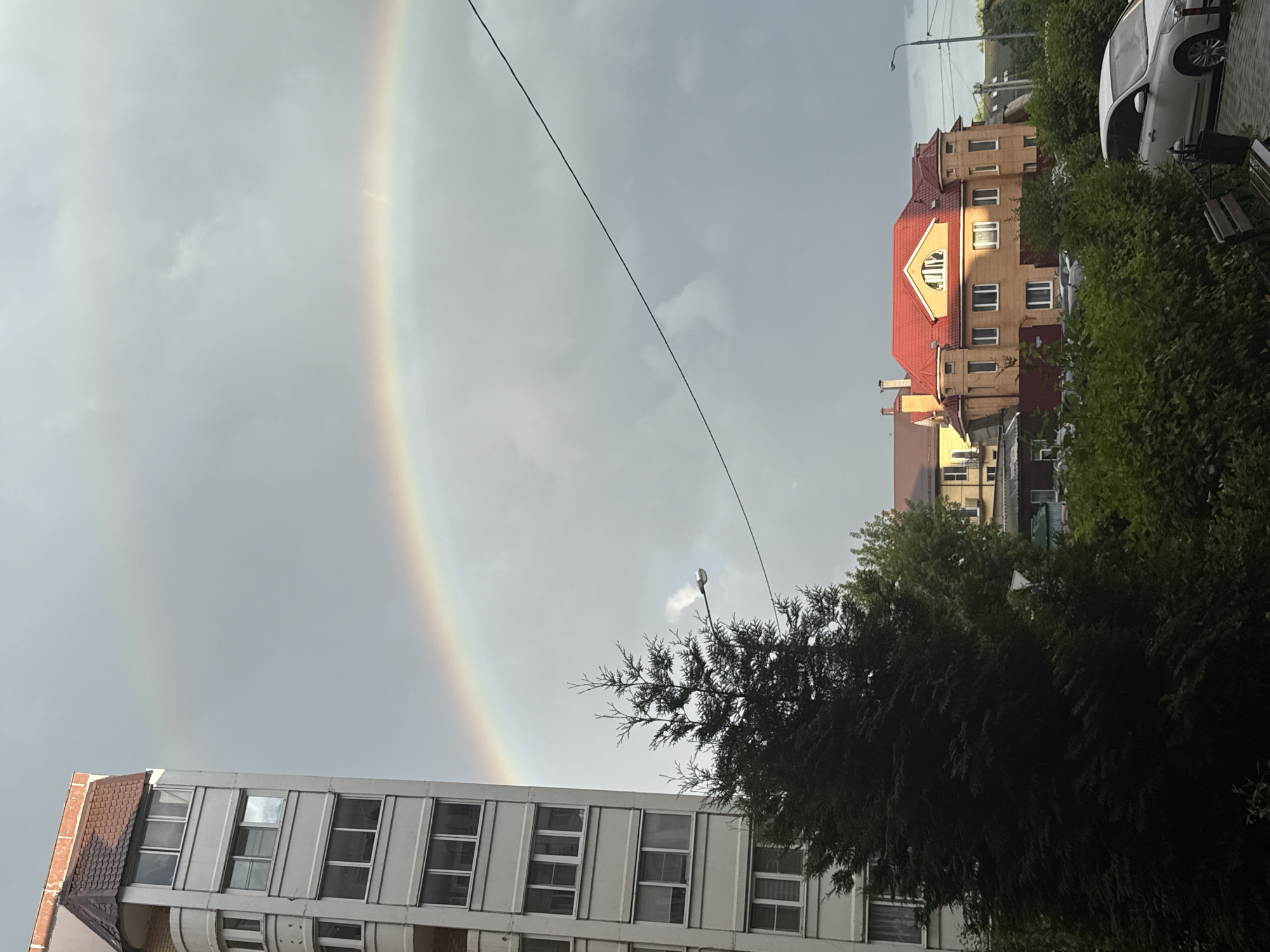 Rainbow over Razvilka's mix of apartments and houses