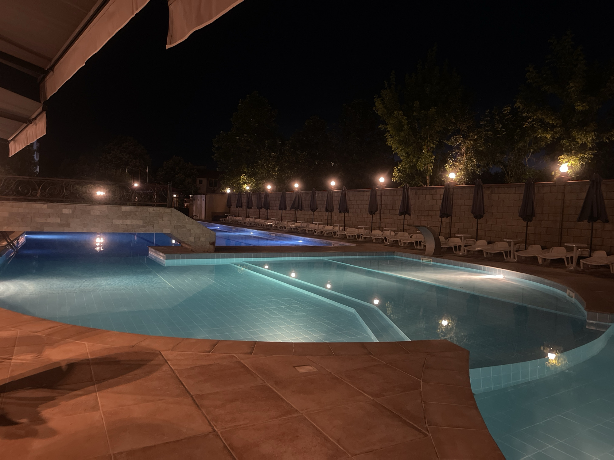 Evening dining and pool time at resort in Ruse