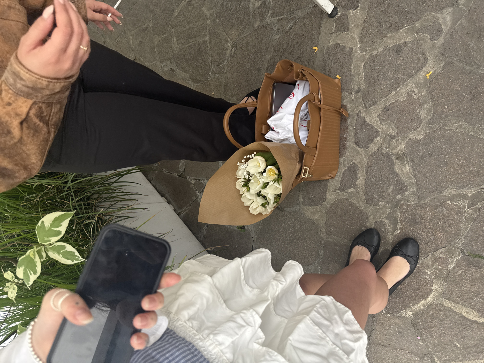 Graduation ceremony and social gathering documented in Milan