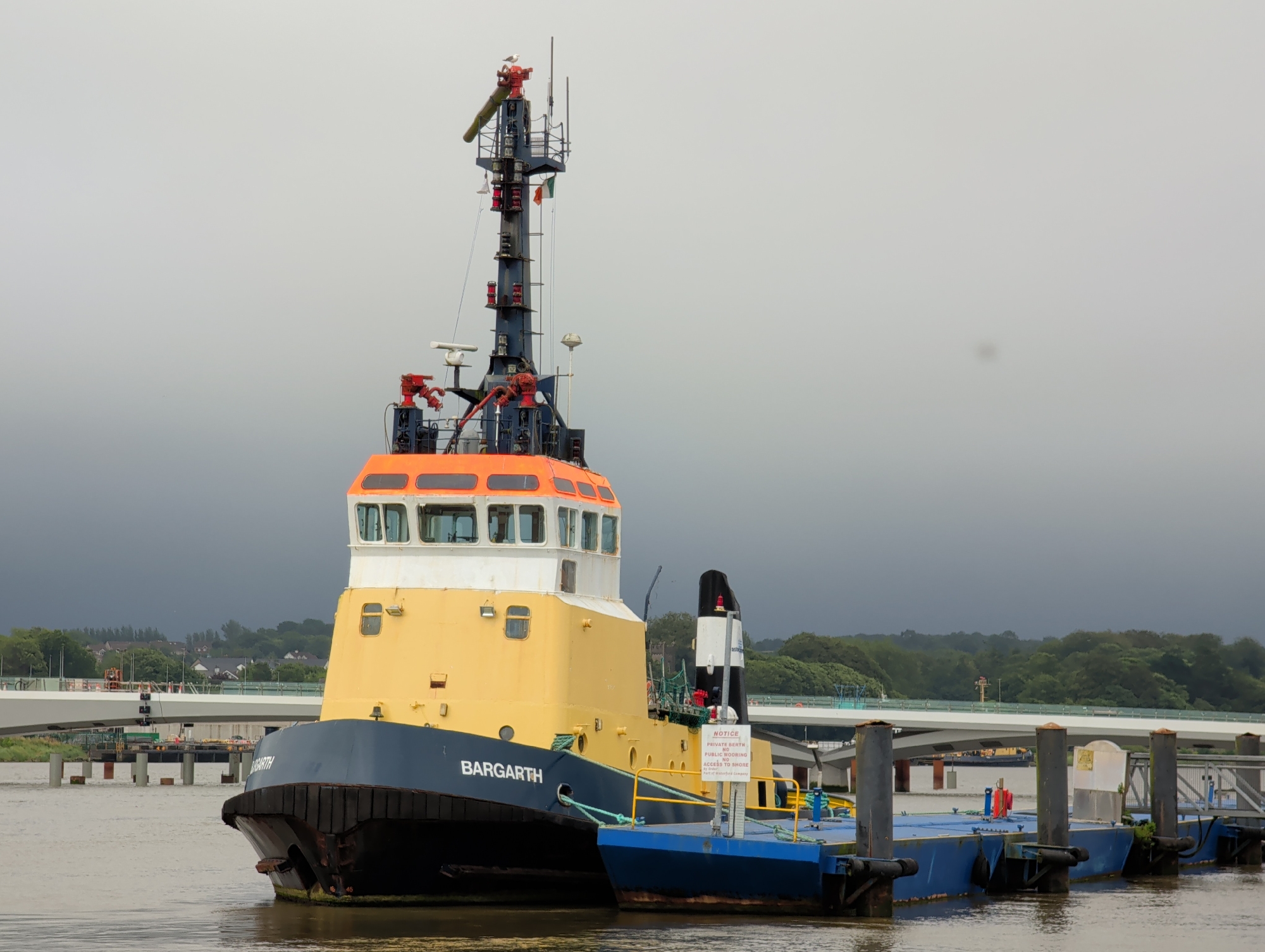 Tugboat BARGARTH docked along Waterford's cloudy waterfront
