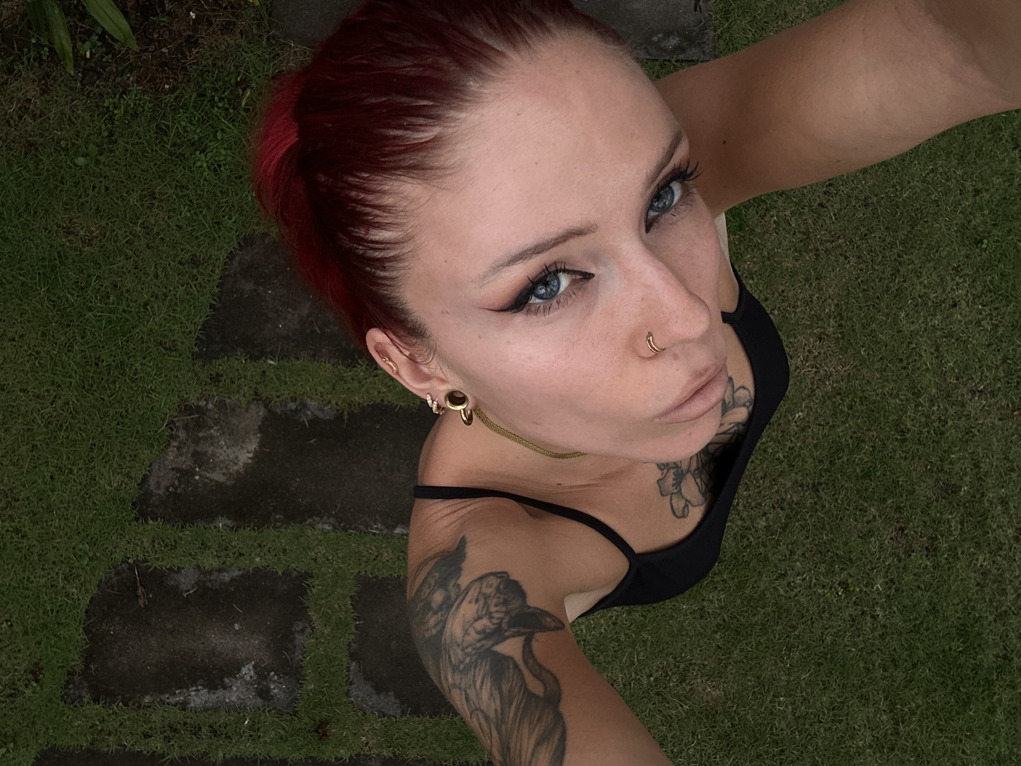 Tattooed woman photographed multiple times in North Kuta morning session