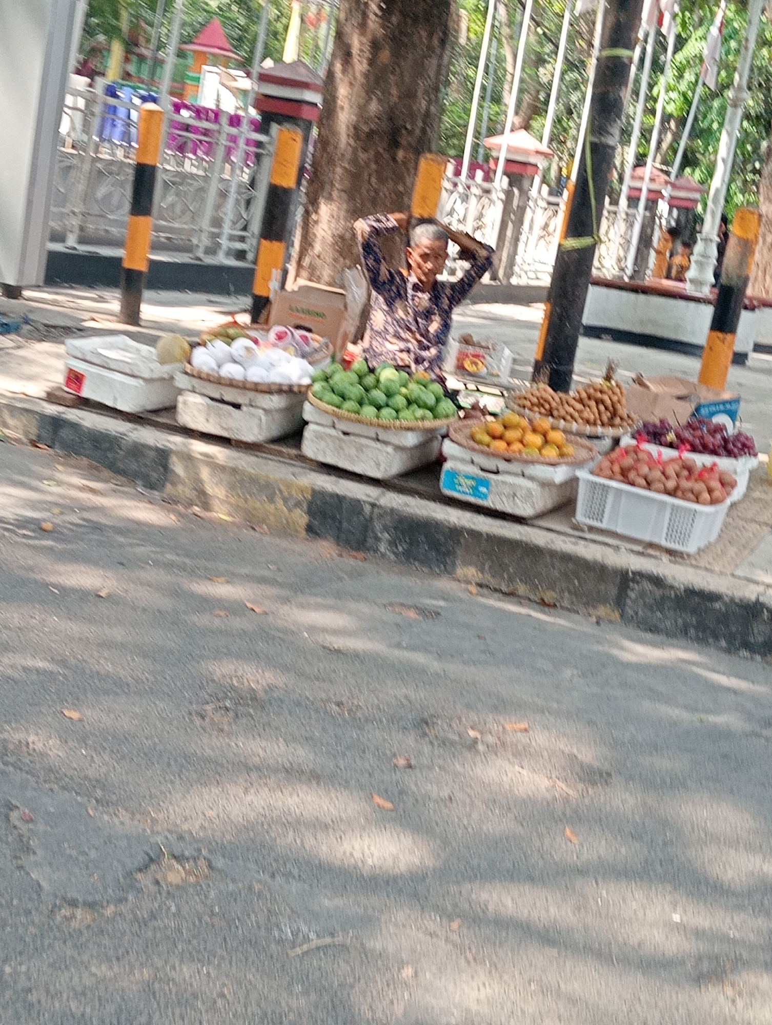 Morning street life across two neighboring Indonesian towns