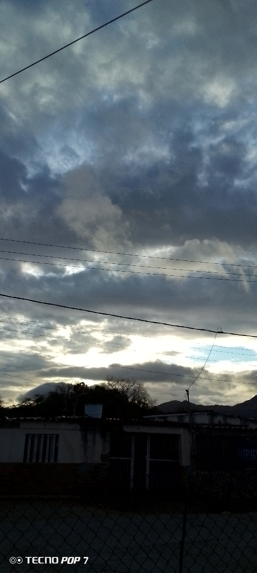 Changing clouds observed over Altagracia, Venezuela residential area