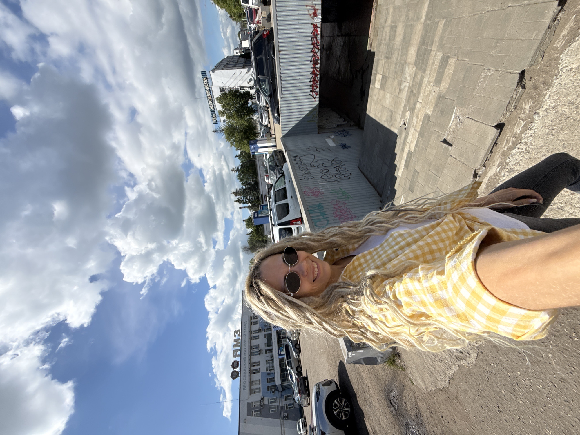 Woman Takes Selfie in Yellow Checkered Shirt