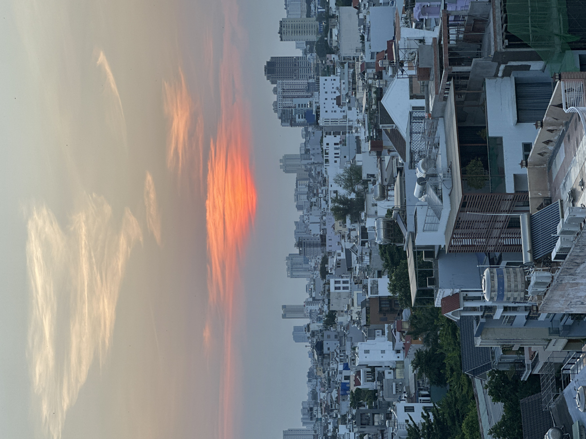 Sunset panorama documented over Ho Chi Minh City skyline