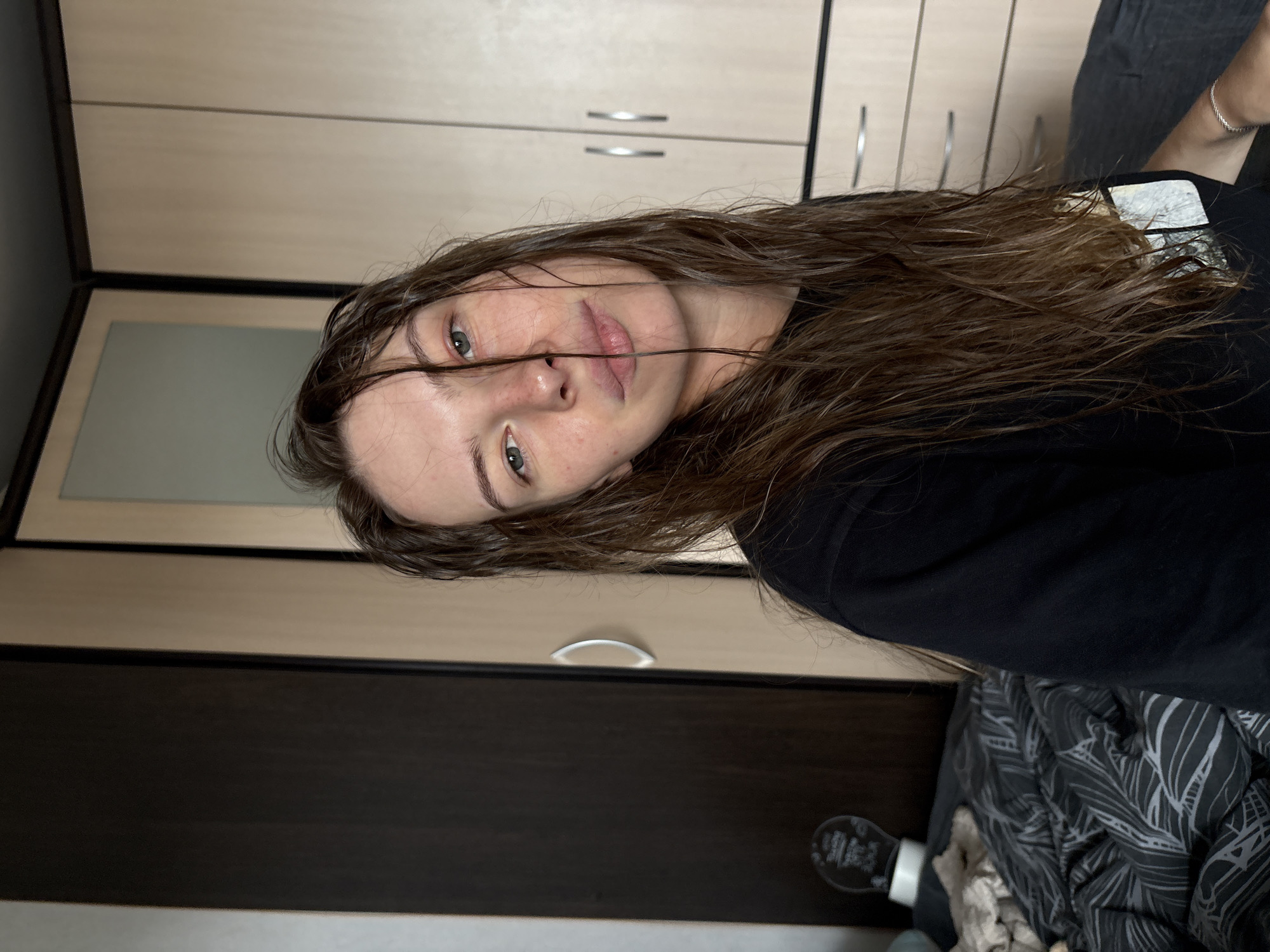 Post-shower selfies and morning coffee in a Perm bedroom