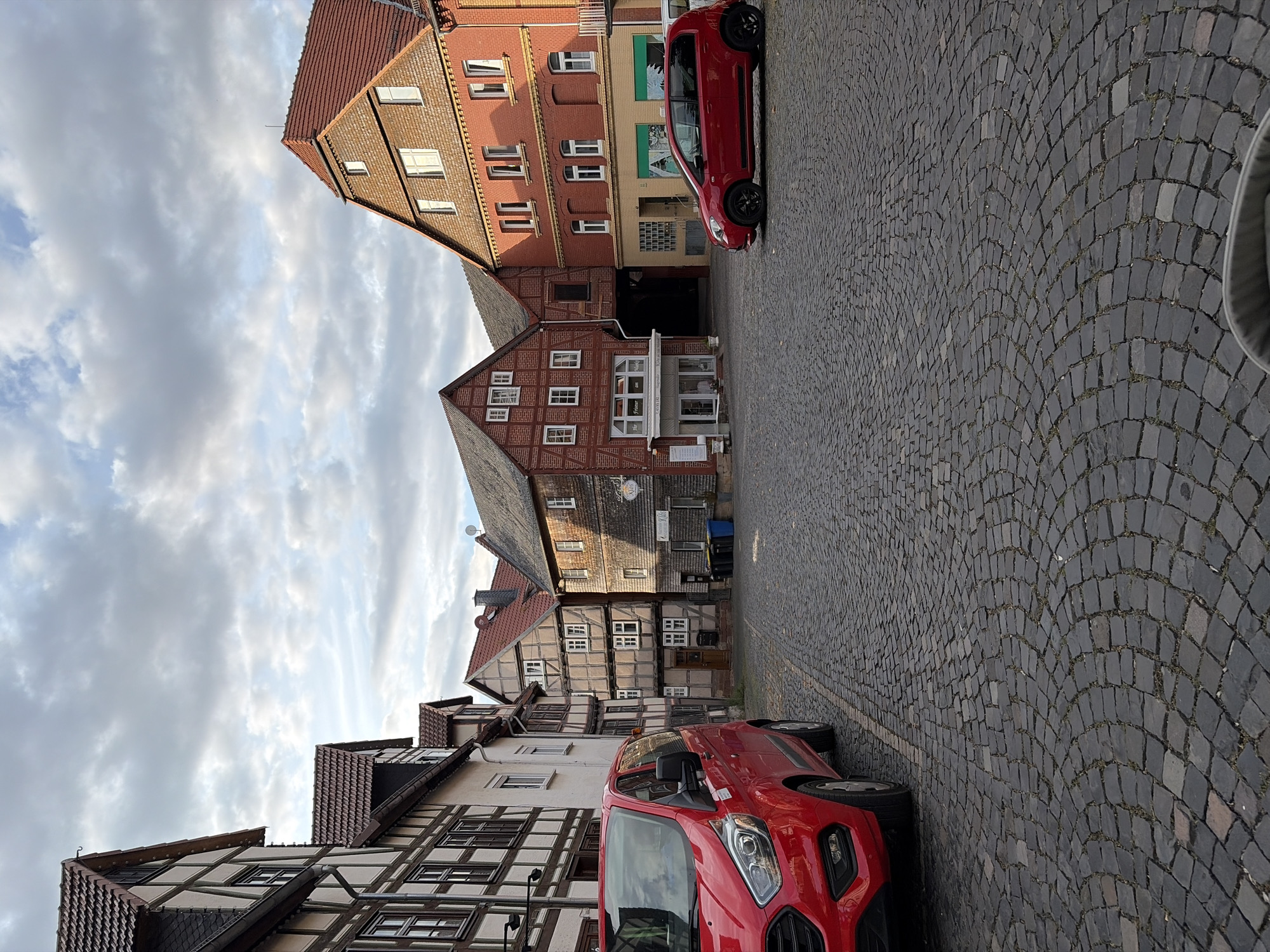 Cobblestone streets and folk art in a historic European town square