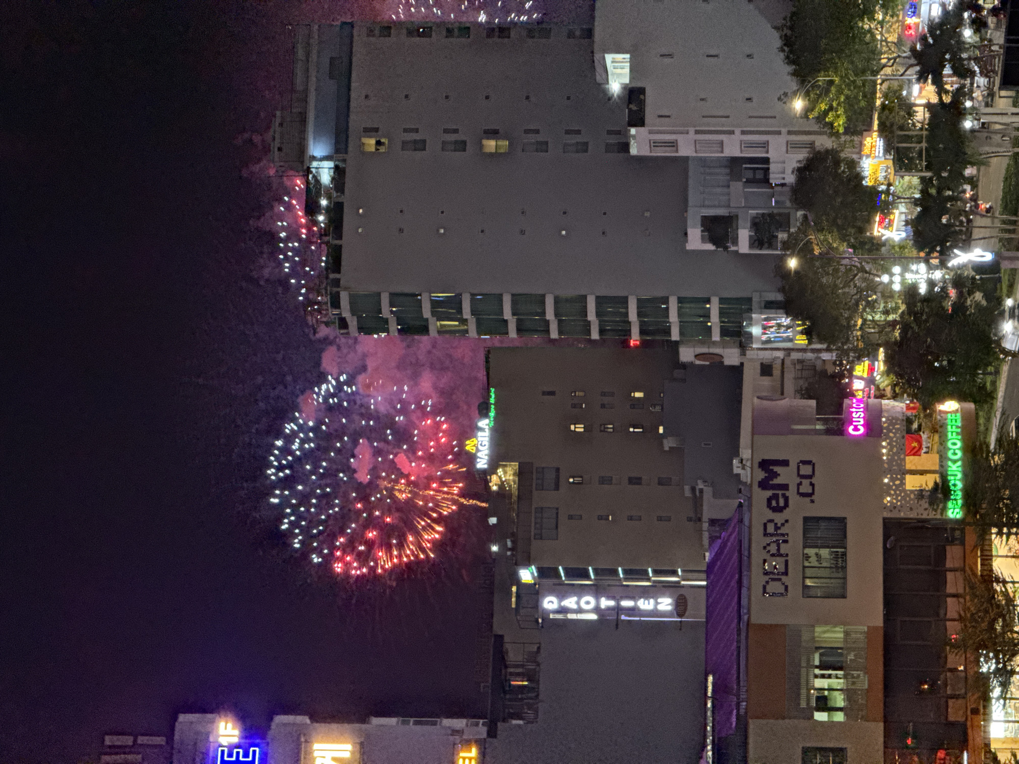 Fireworks display over Đà Nẵng's city skyline at night