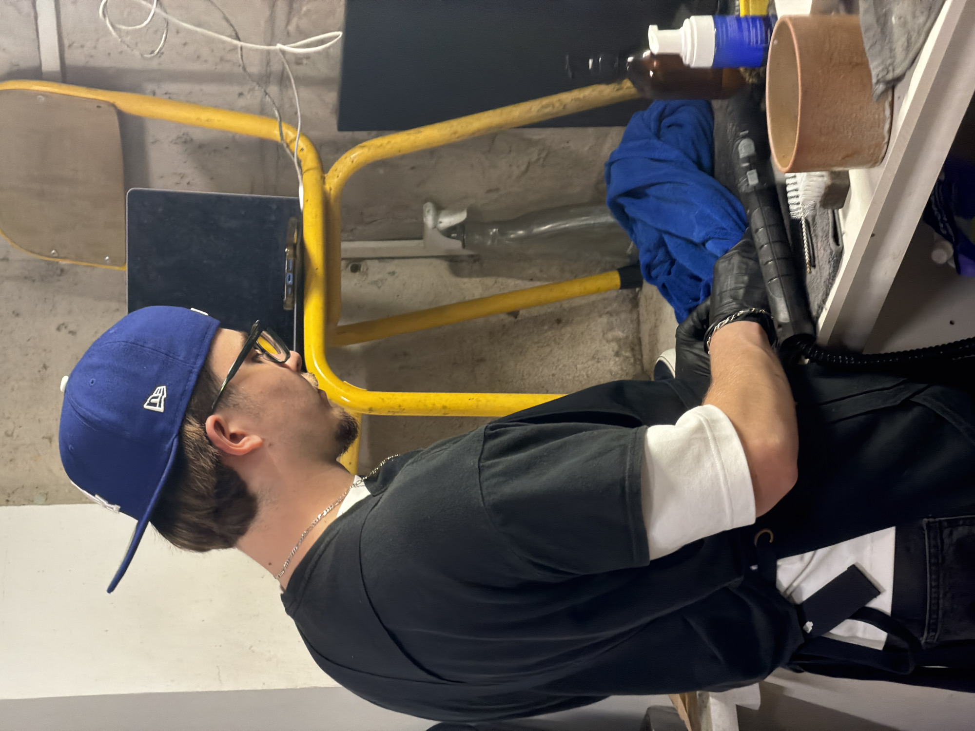Workers clean, restore shoes at Paris footwear service facility