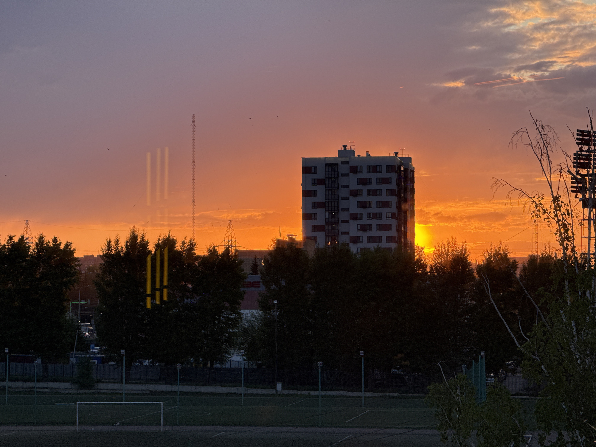 Sunset photographed across multiple Krasnoyarsk locations during golden hour