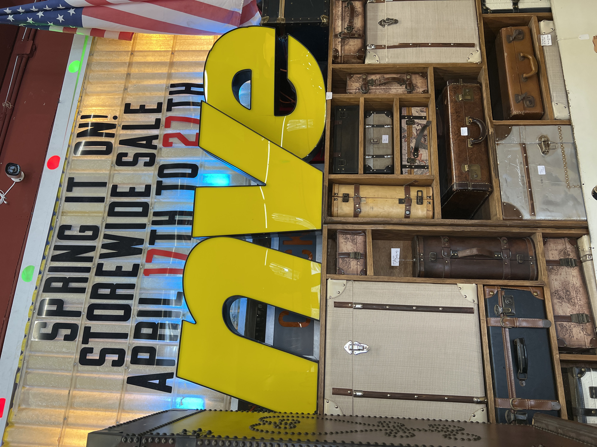 Visitor documents vintage collectibles shop interior in Newburgh, NY