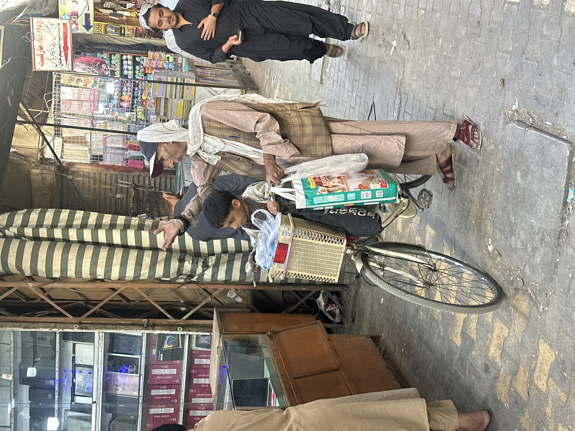 Street interaction and mosque interior in Quetta City