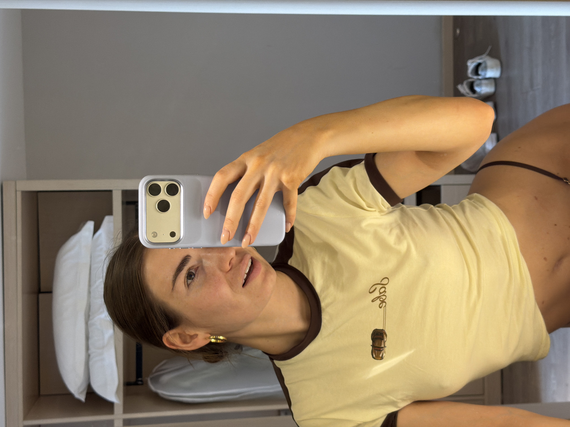 Woman takes mirror selfie in residential setting, Shunyi District