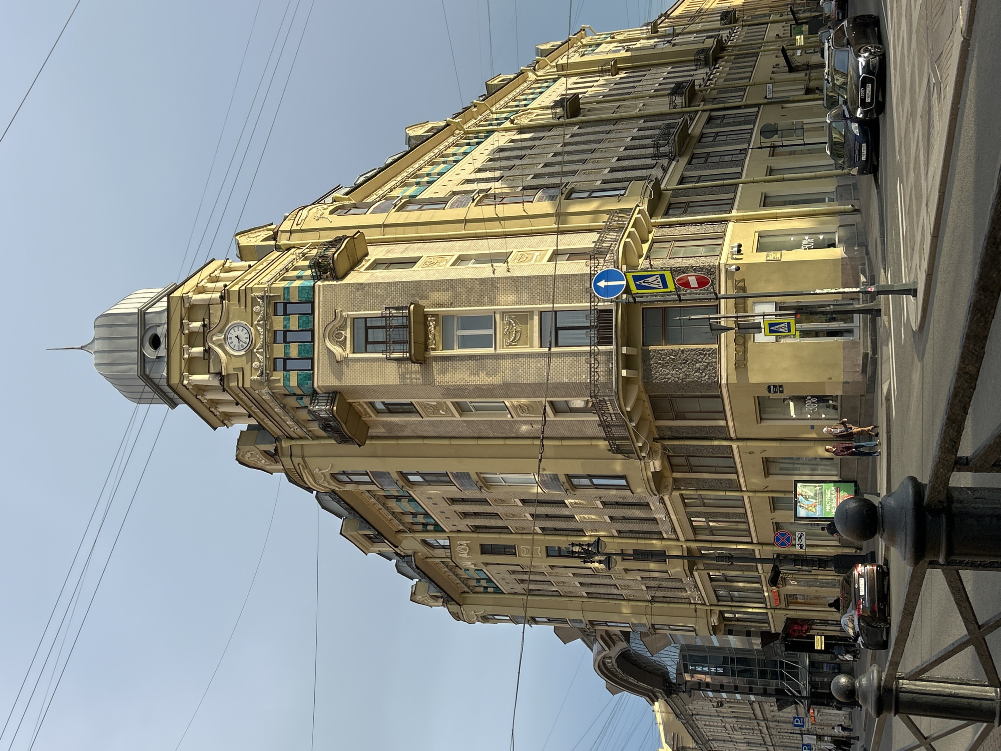 Street-level drift through Saint Petersburg's canals, trams, and ornate facades