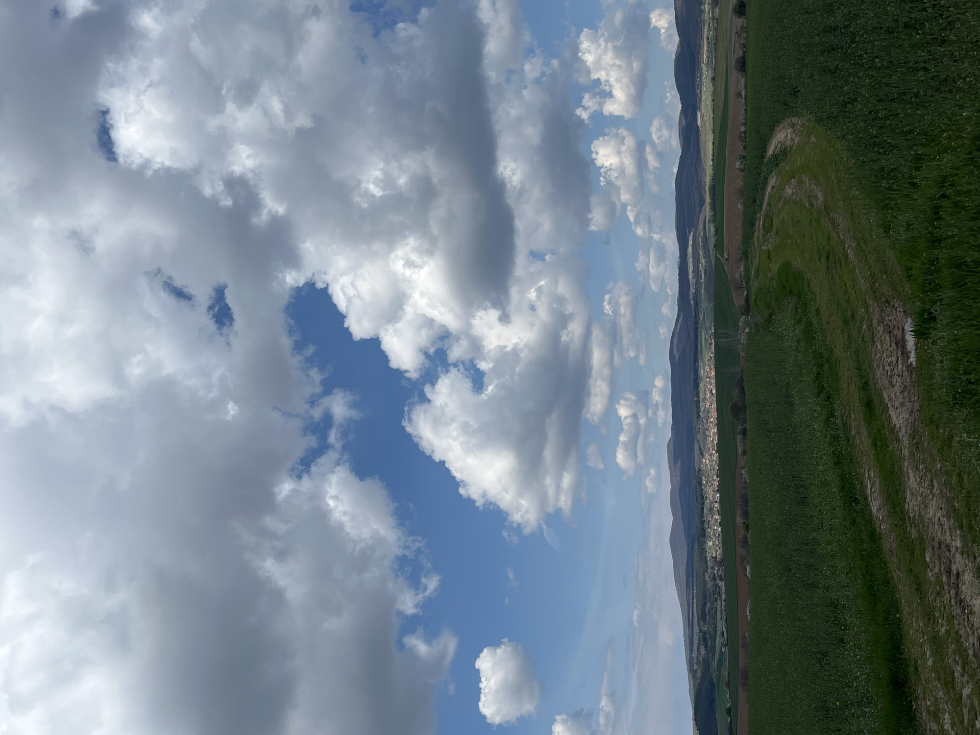 Spring landscape observed near Krapets, Bulgaria shows cloudy skies