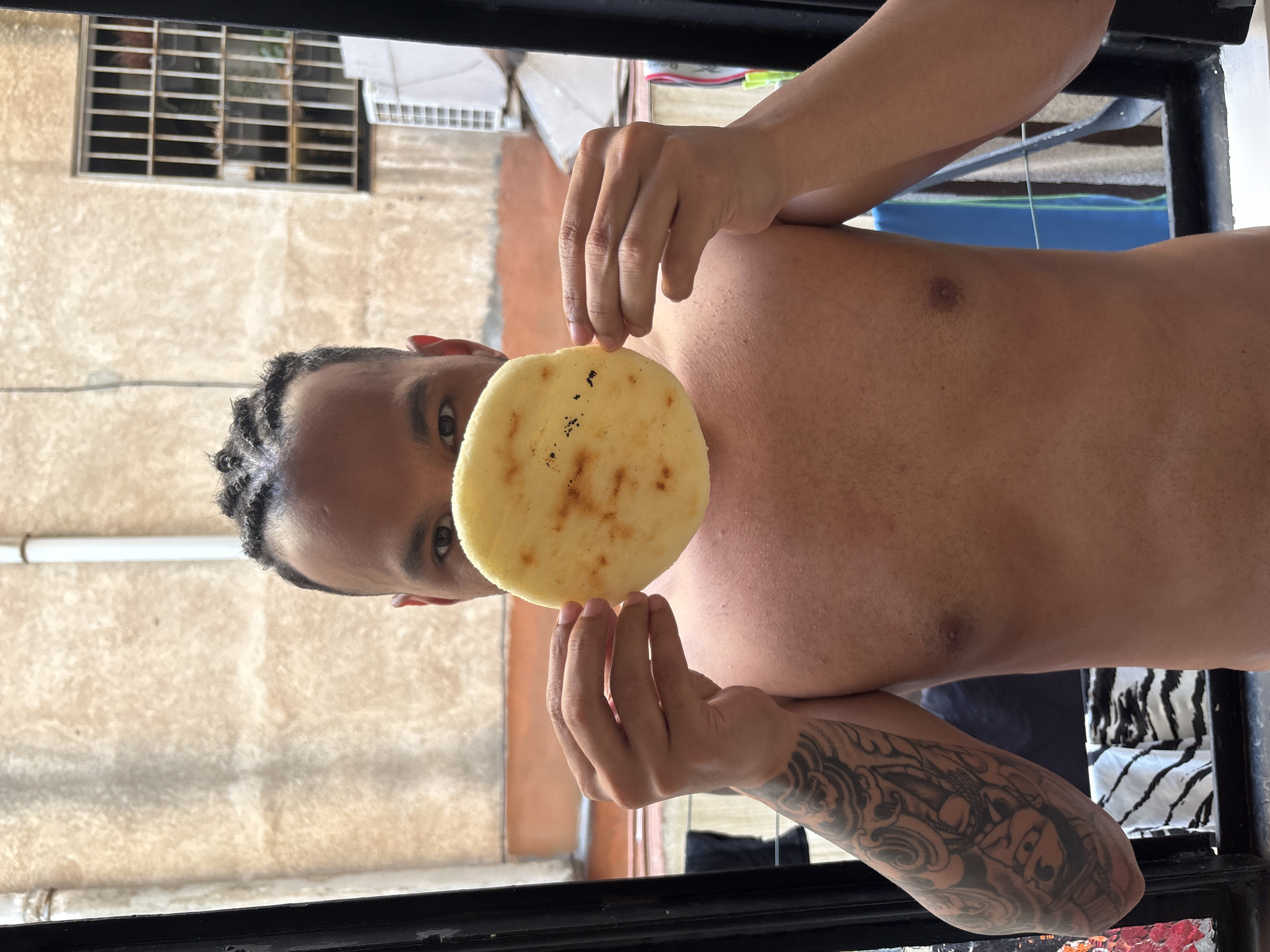 Morning arepa breakfast captured across Barcelona apartment