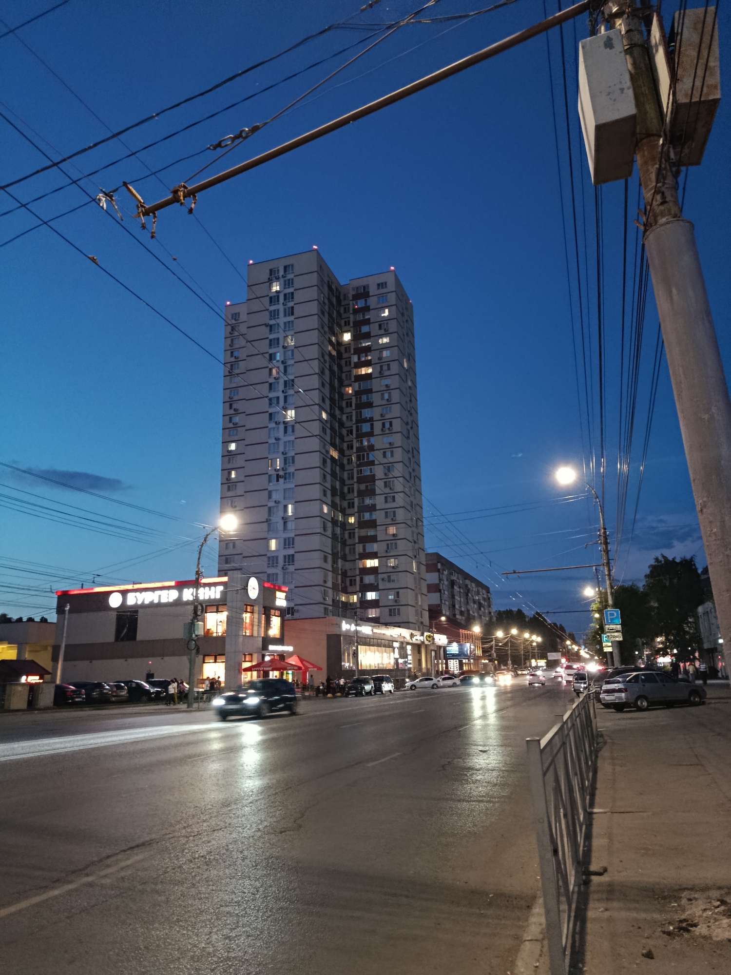 Saratov streets at dusk, storefronts and Soviet-era architecture