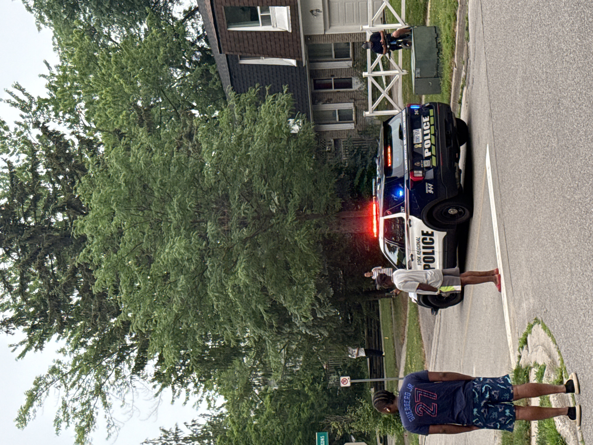Overturned vehicle on Richmond Hill residential street draws emergency response