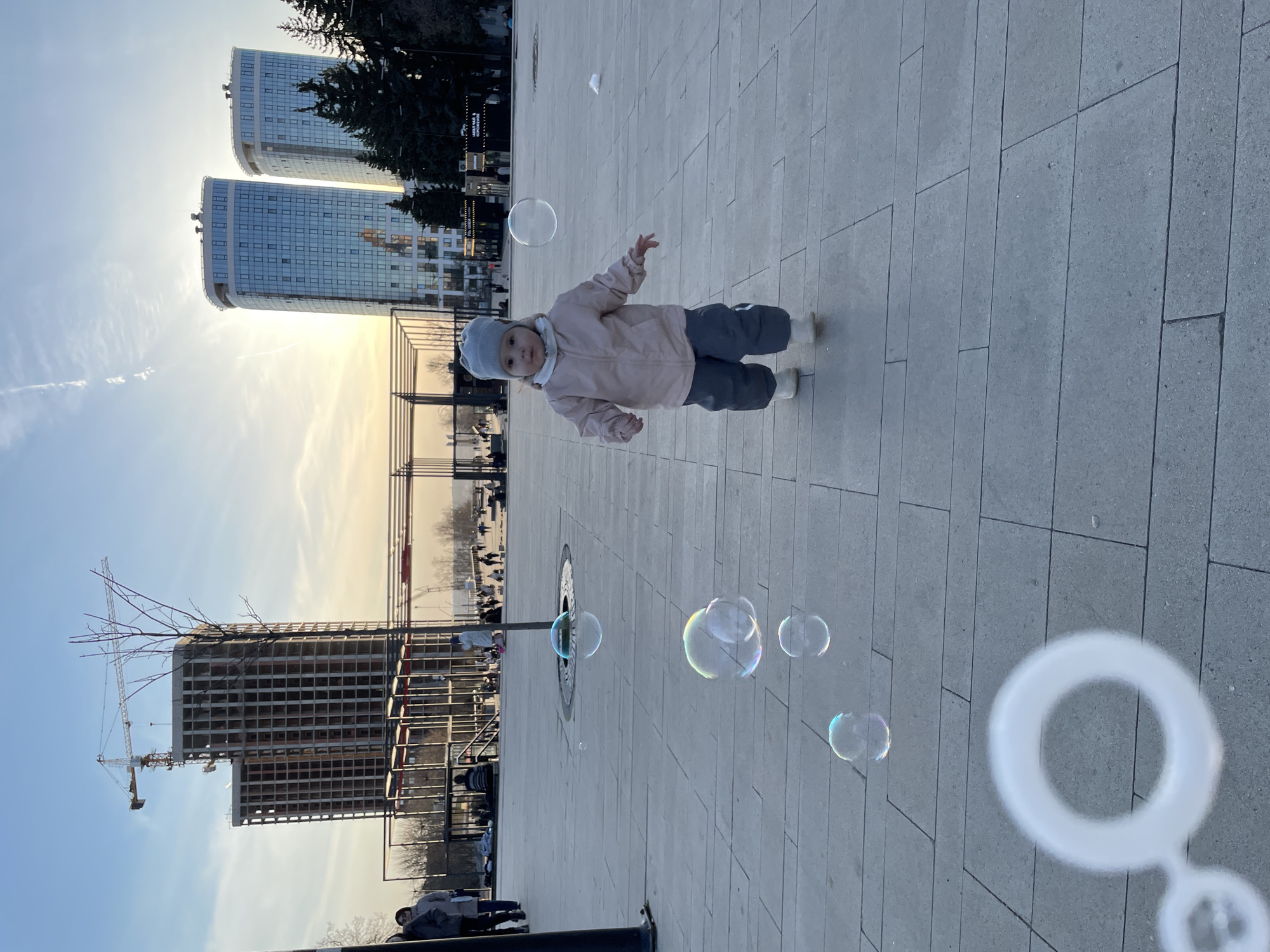 Child plays with soap bubbles in Izhevsk plaza