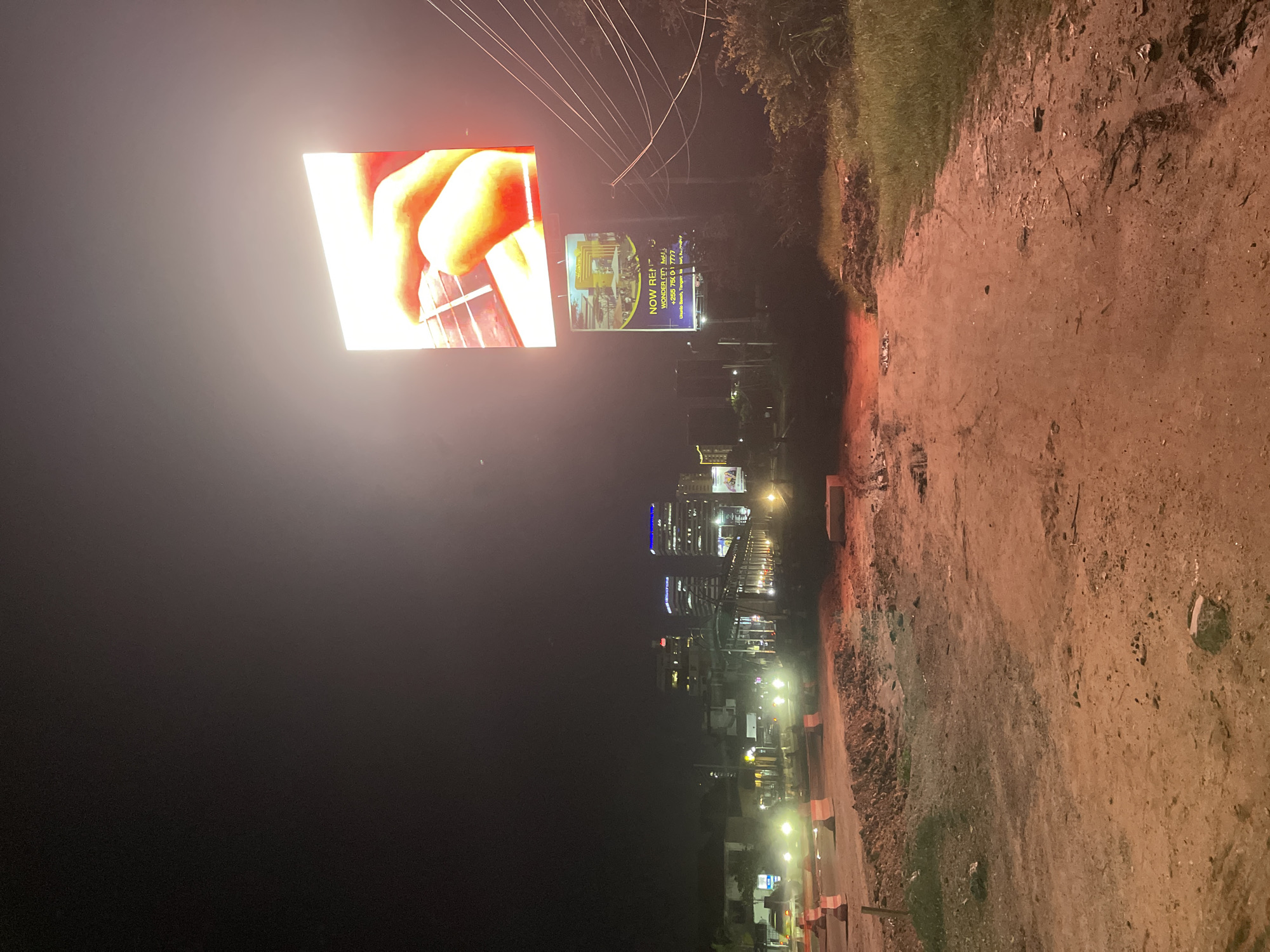 Nighttime construction activity documented near Dar es Salaam mall
