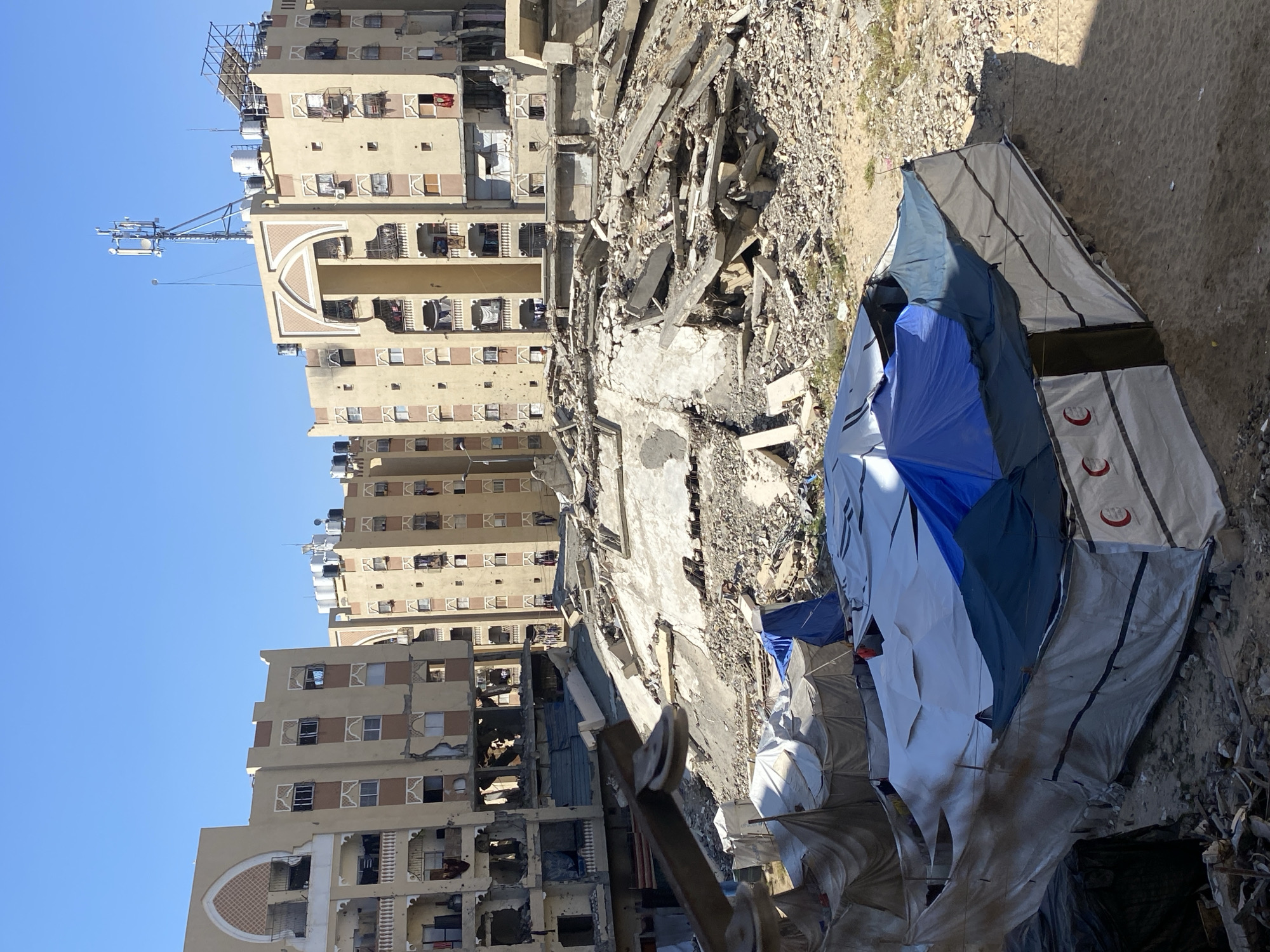 Widespread building damage documented in Khan Yunis with aid tents