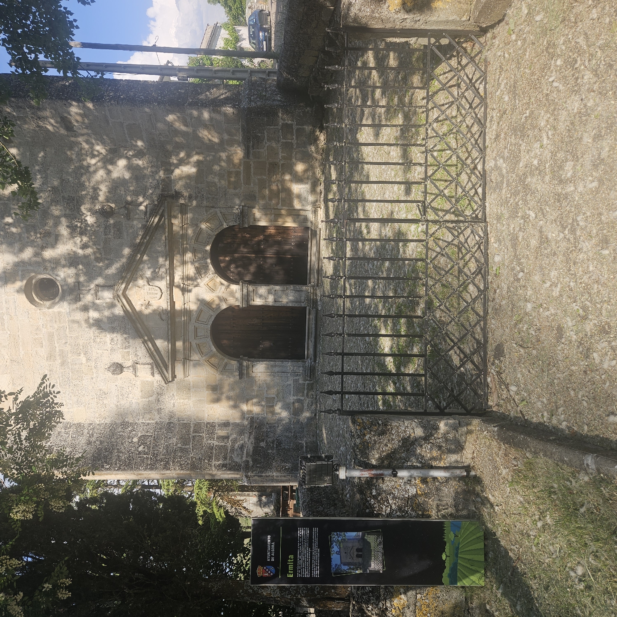 Visitor documents historic fountains and landmarks in Algora, Spain