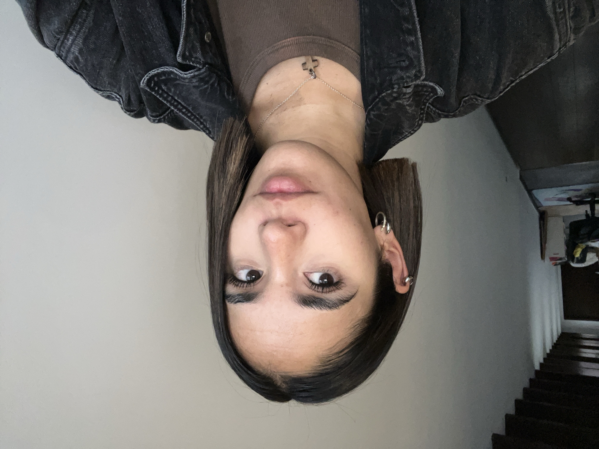 Person photographed indoors in San Bernardino Tlaxcalancingo, Mexico