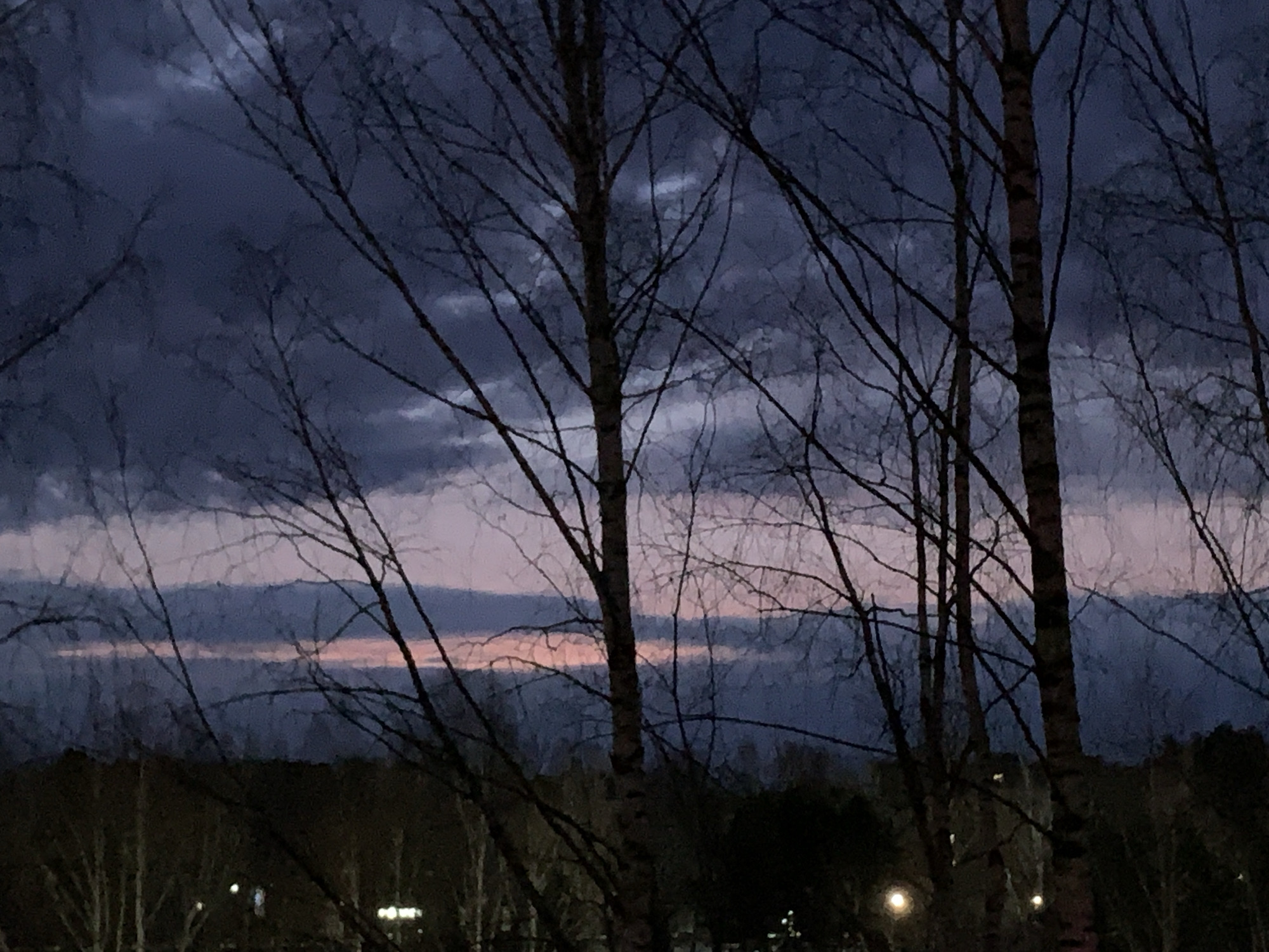 Night sky observed over Chaikovsky, Russia with colorful horizon
