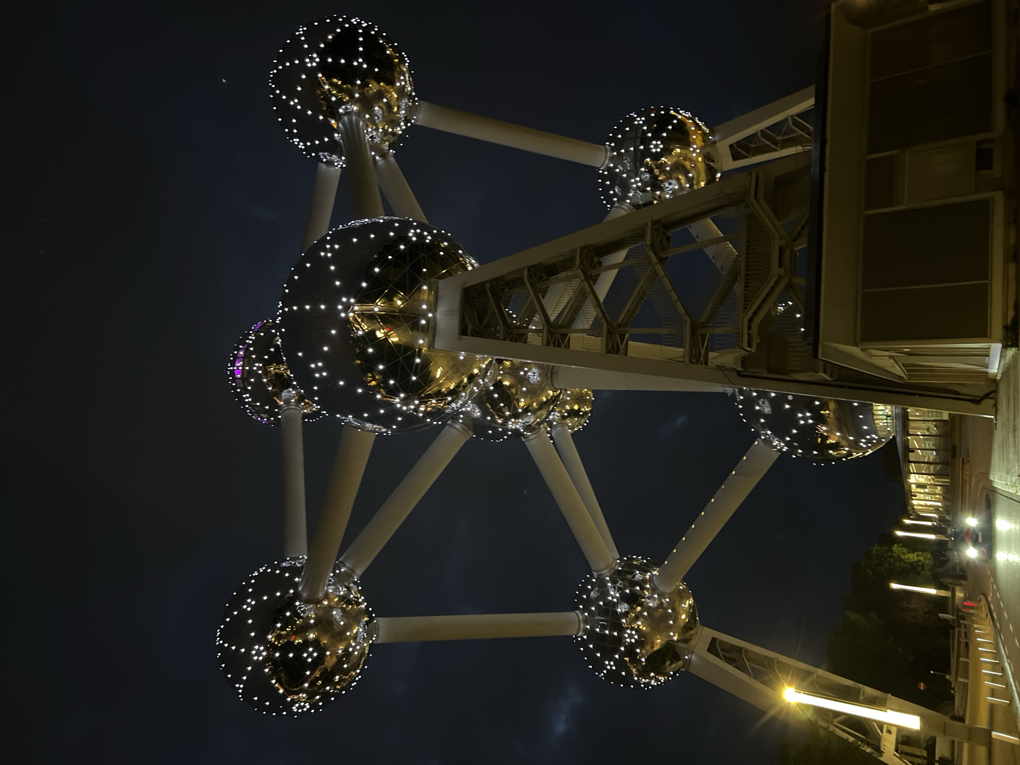 Brussels Atomium illuminated at night with decorative lighting