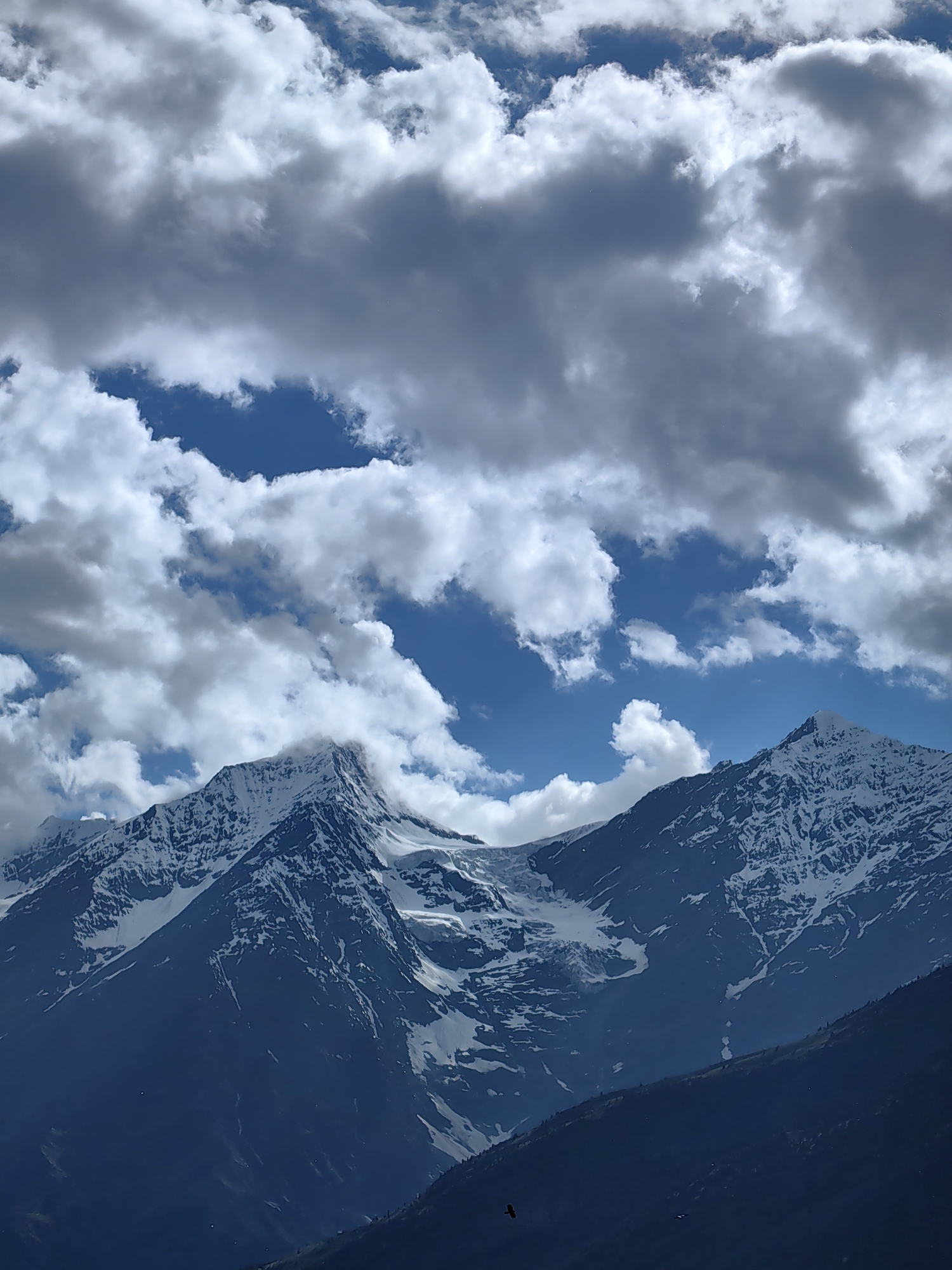 Morning in Keylong: peaks, village terraces, and open skies