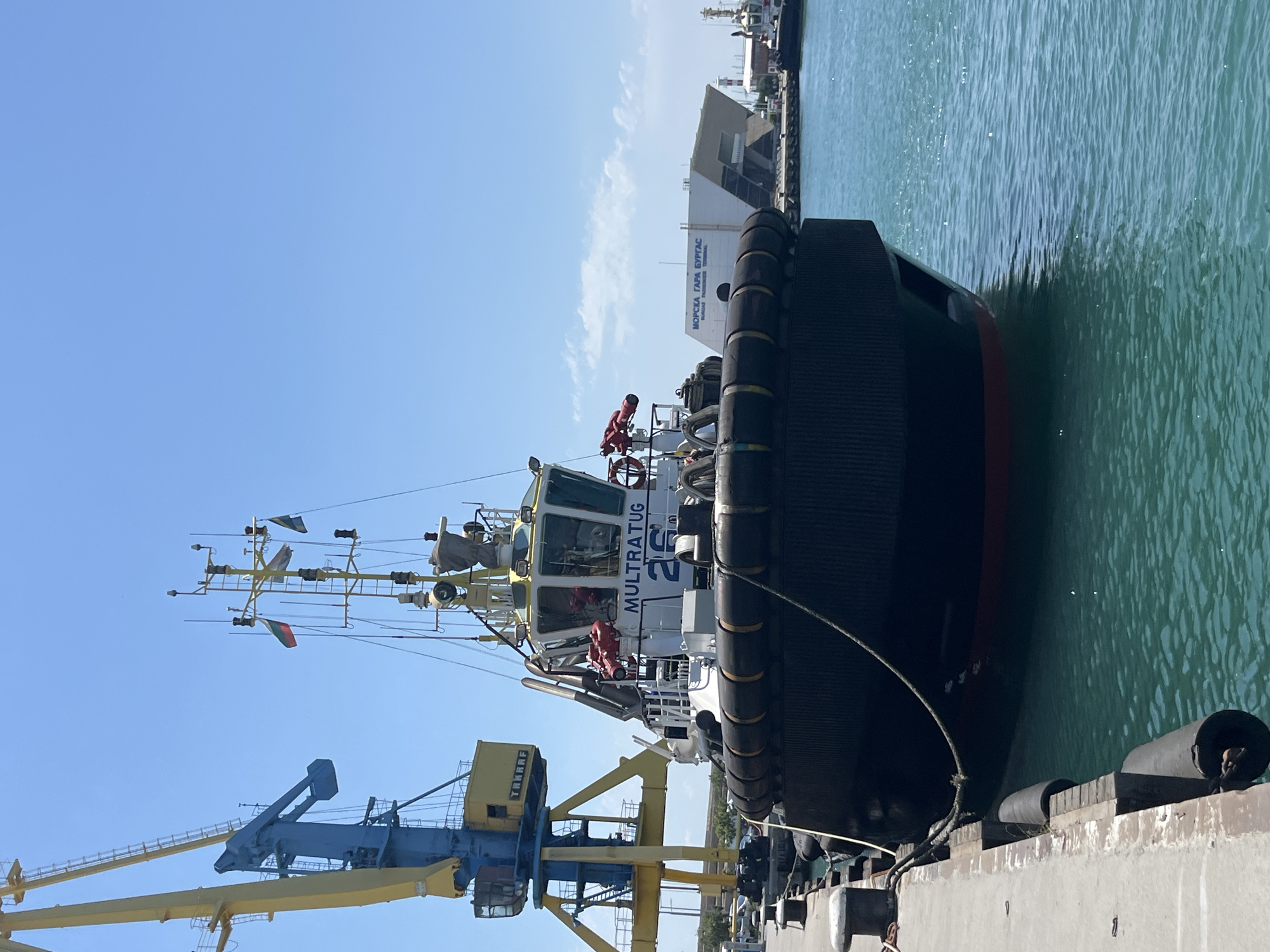 Tugboats and breakfast at Burgas port on a sunny morning