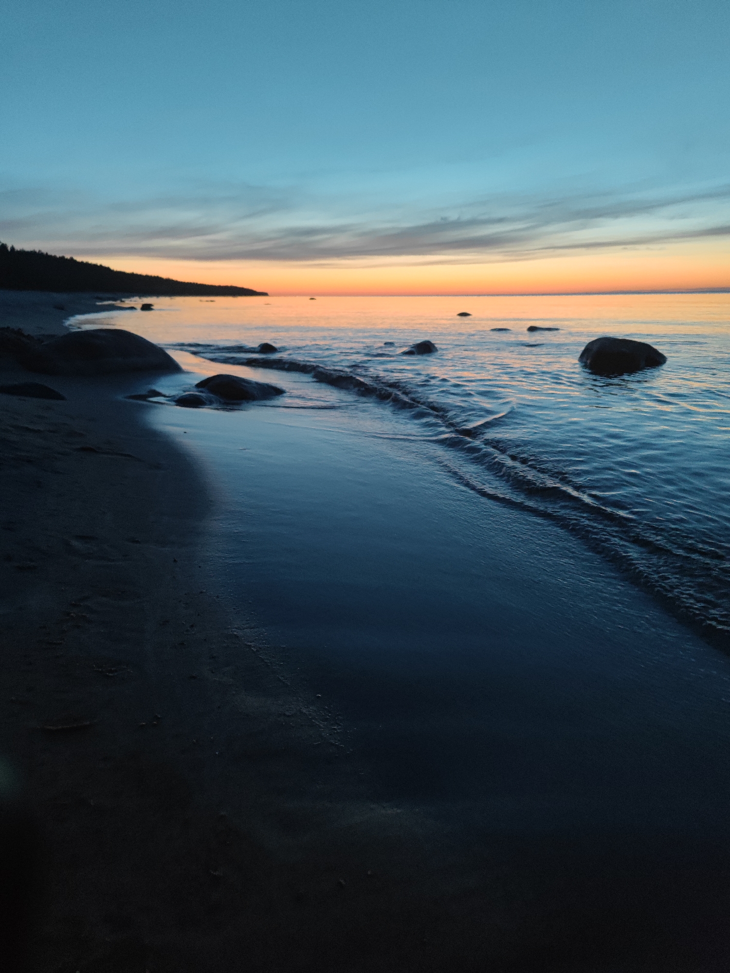 Beach camping trip documented at sunset in Motornoe, Russia