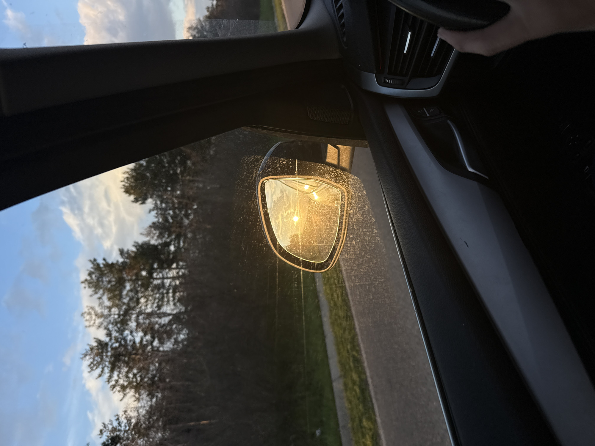 Driver captures sunlit mirror view in Bogomilovo, Bulgaria