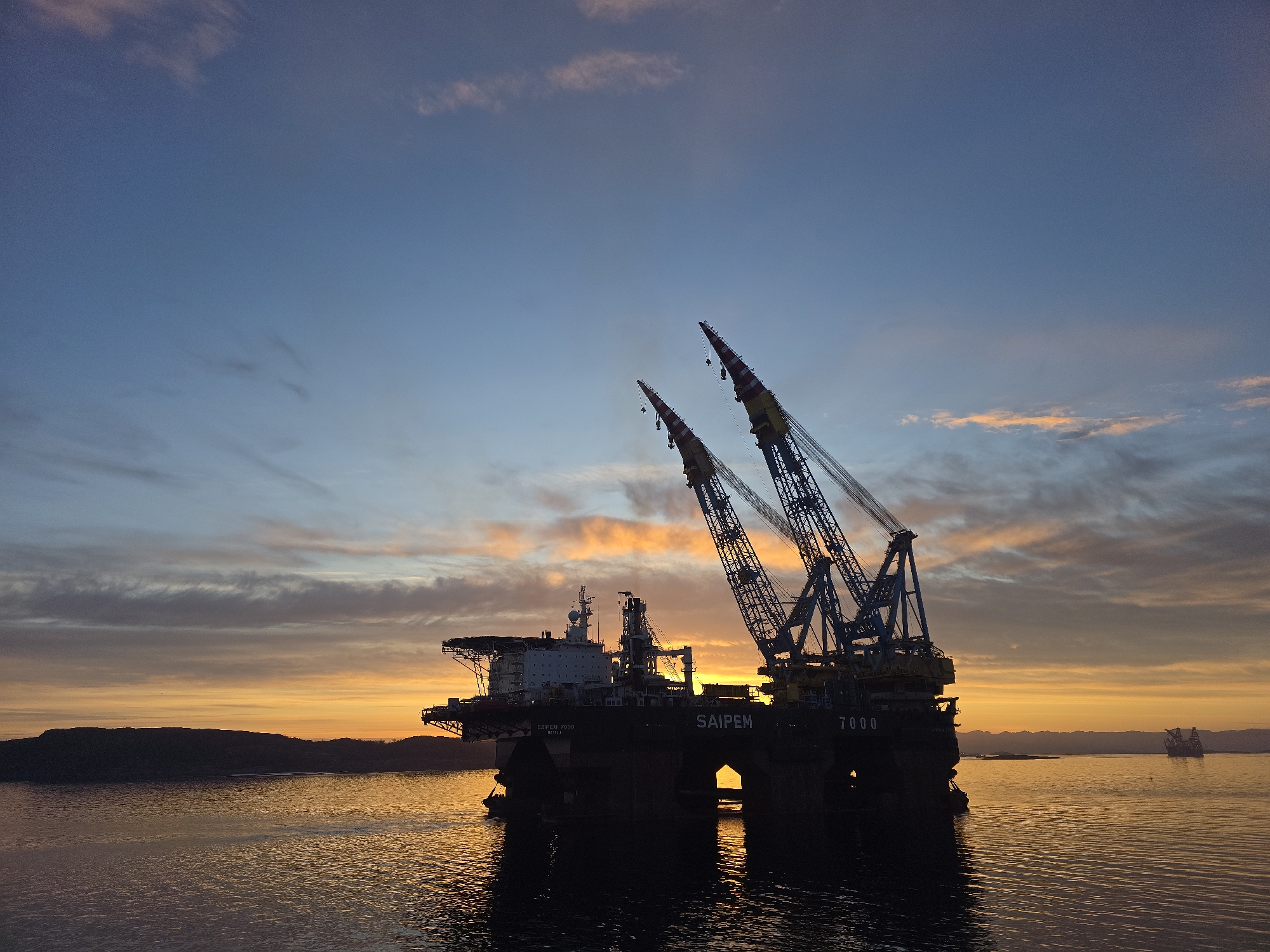 Saipem 7000 crane vessel anchored at sunset near Randaberg