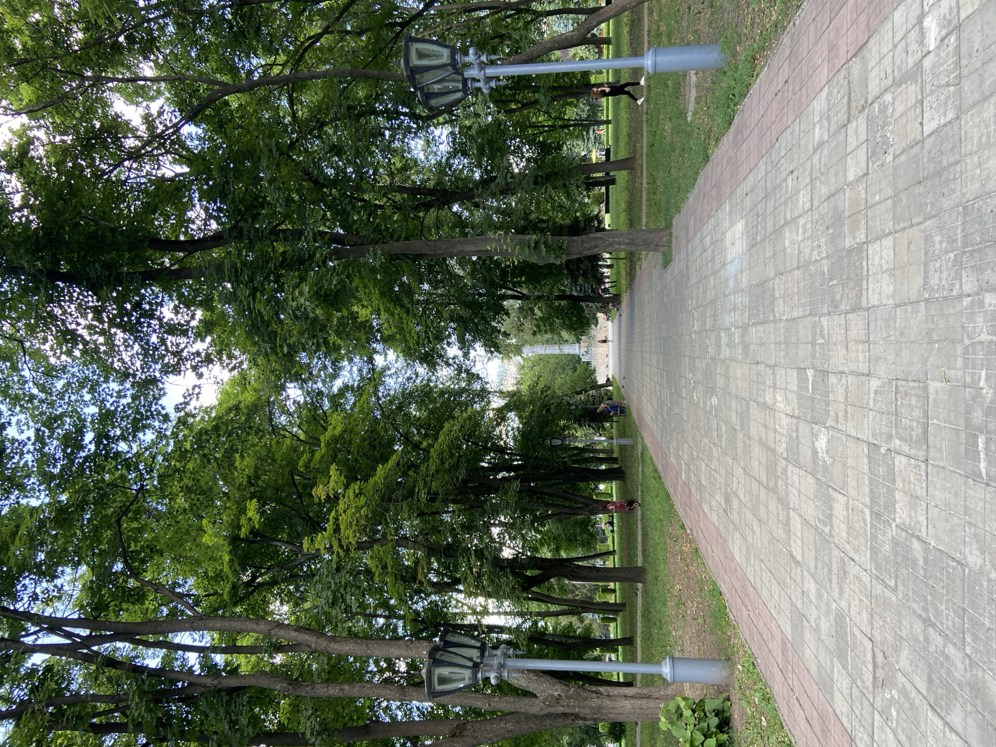 Afternoon in a Poltava city park, monument and all