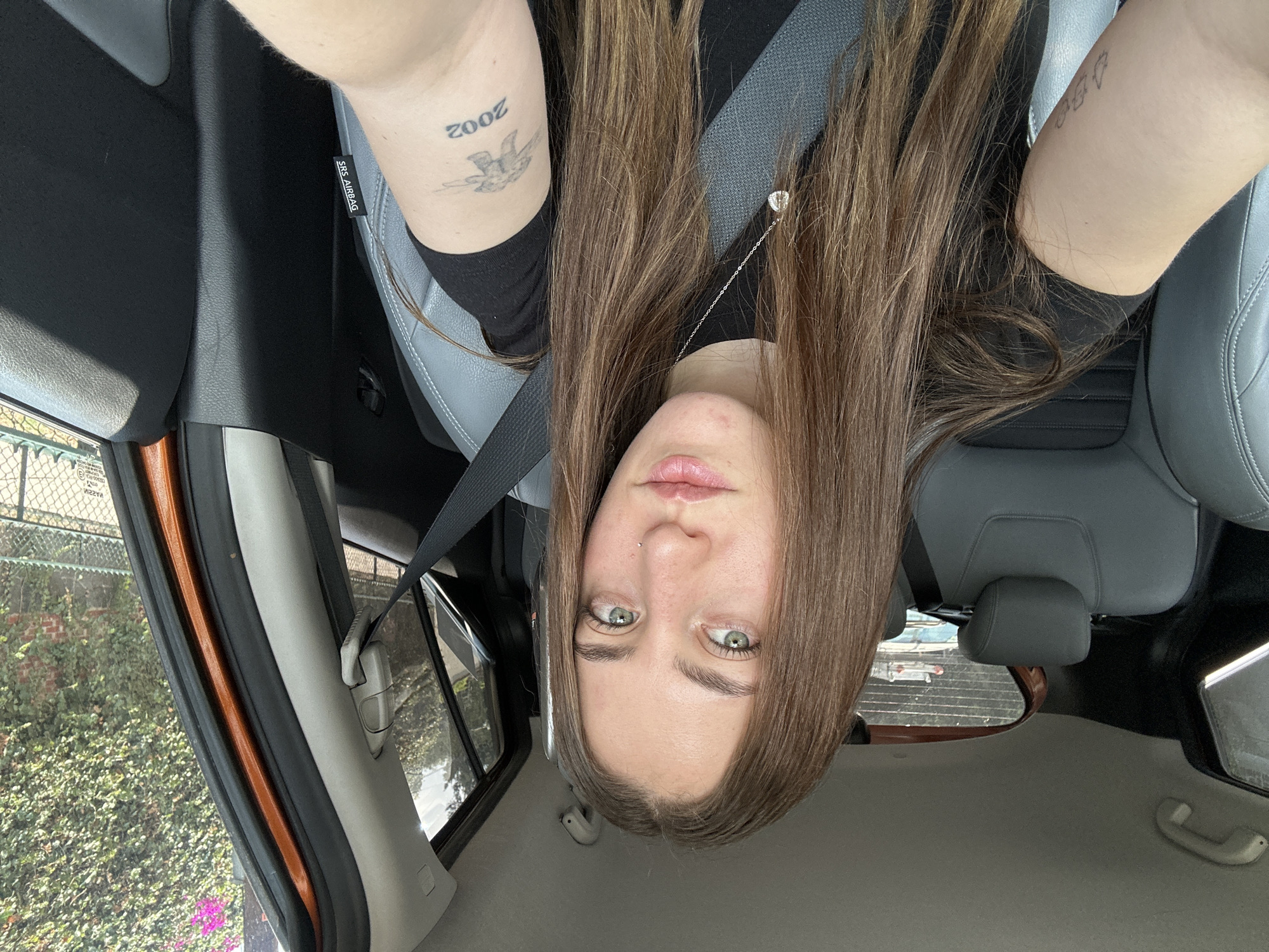 Woman Takes Selfies in Car During Mexico City Afternoon