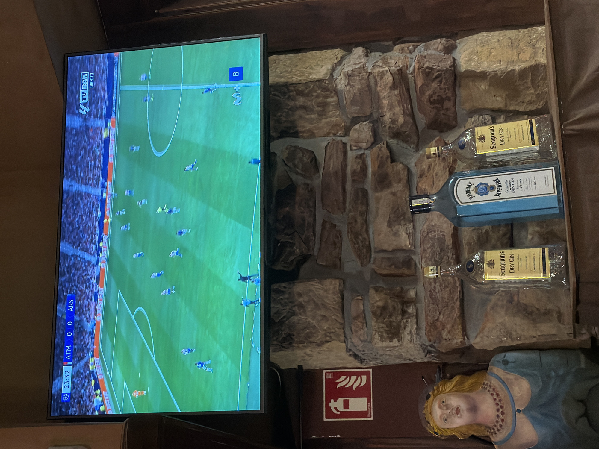 Football match viewed on television in San Sebastián bar