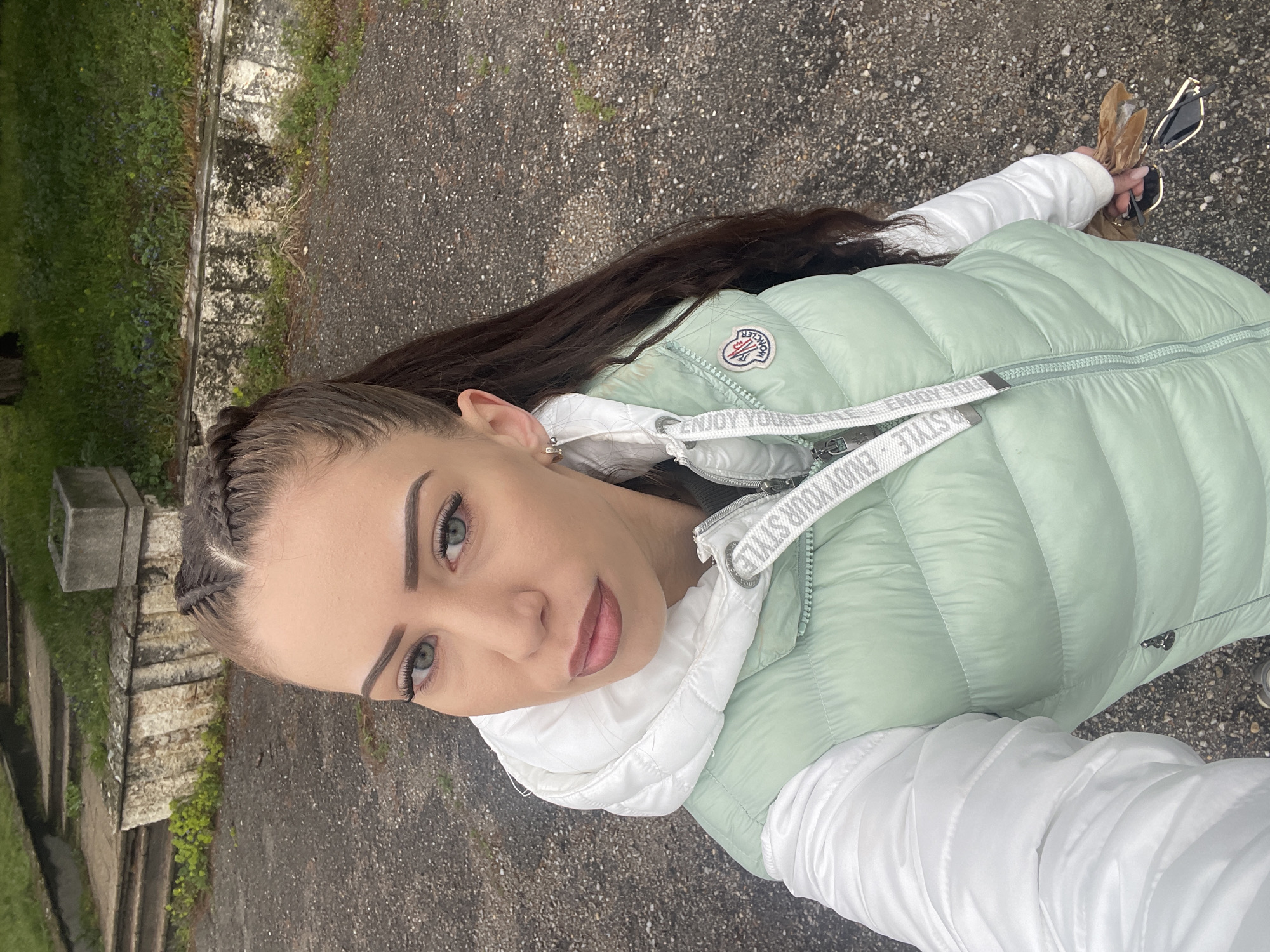 Woman takes selfies by car in Veliko Tarnovo