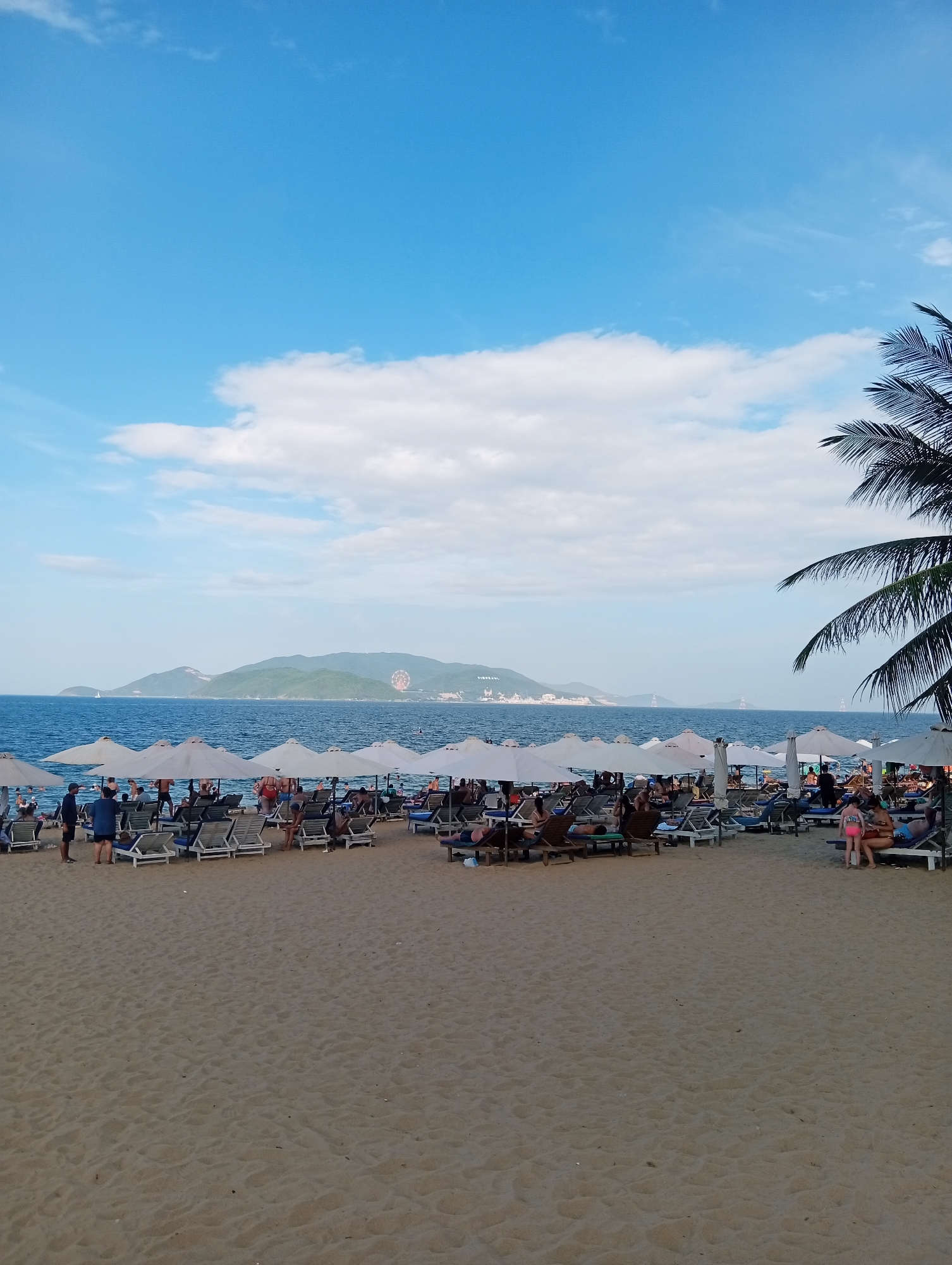 Nha Trang beach and promenade on a busy summer morning