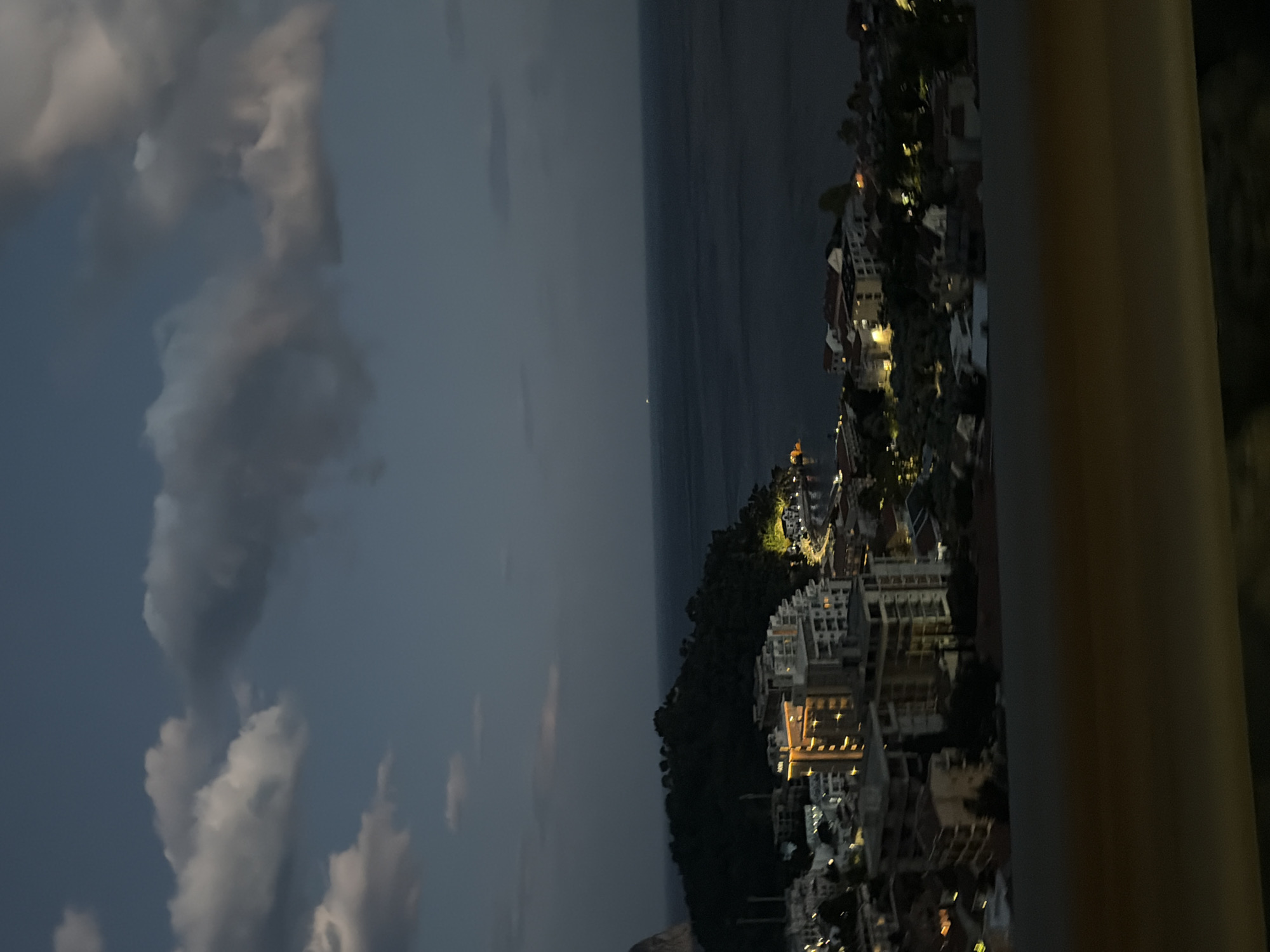 Aerial nighttime view captured of illuminated Nerin, Montenegro