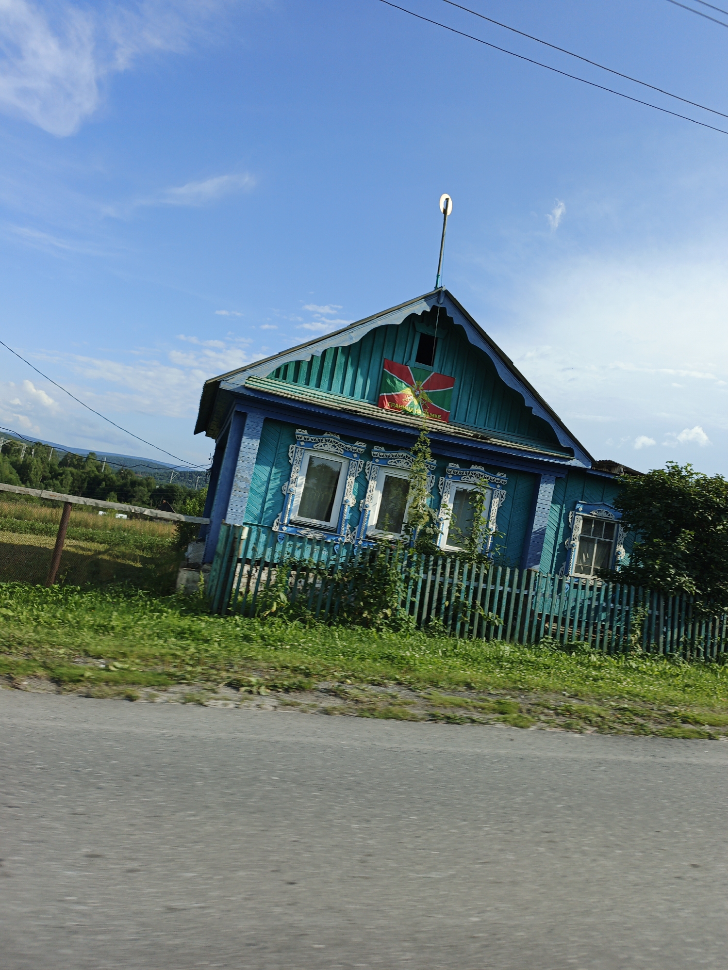 A quiet summer day in a Russian village, rain and all