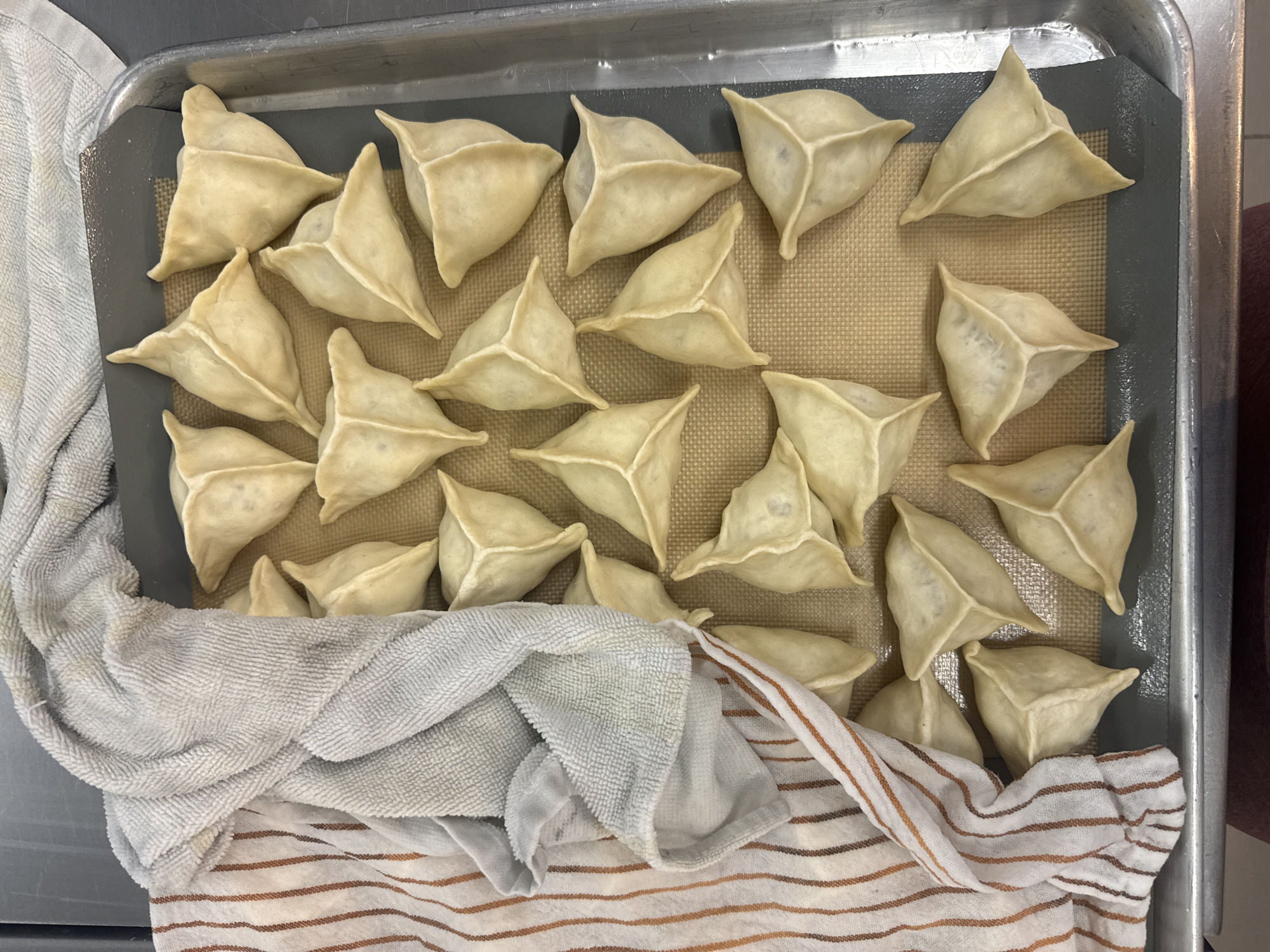 Home baker prepares triangular pastries in Naucalpan de Juárez