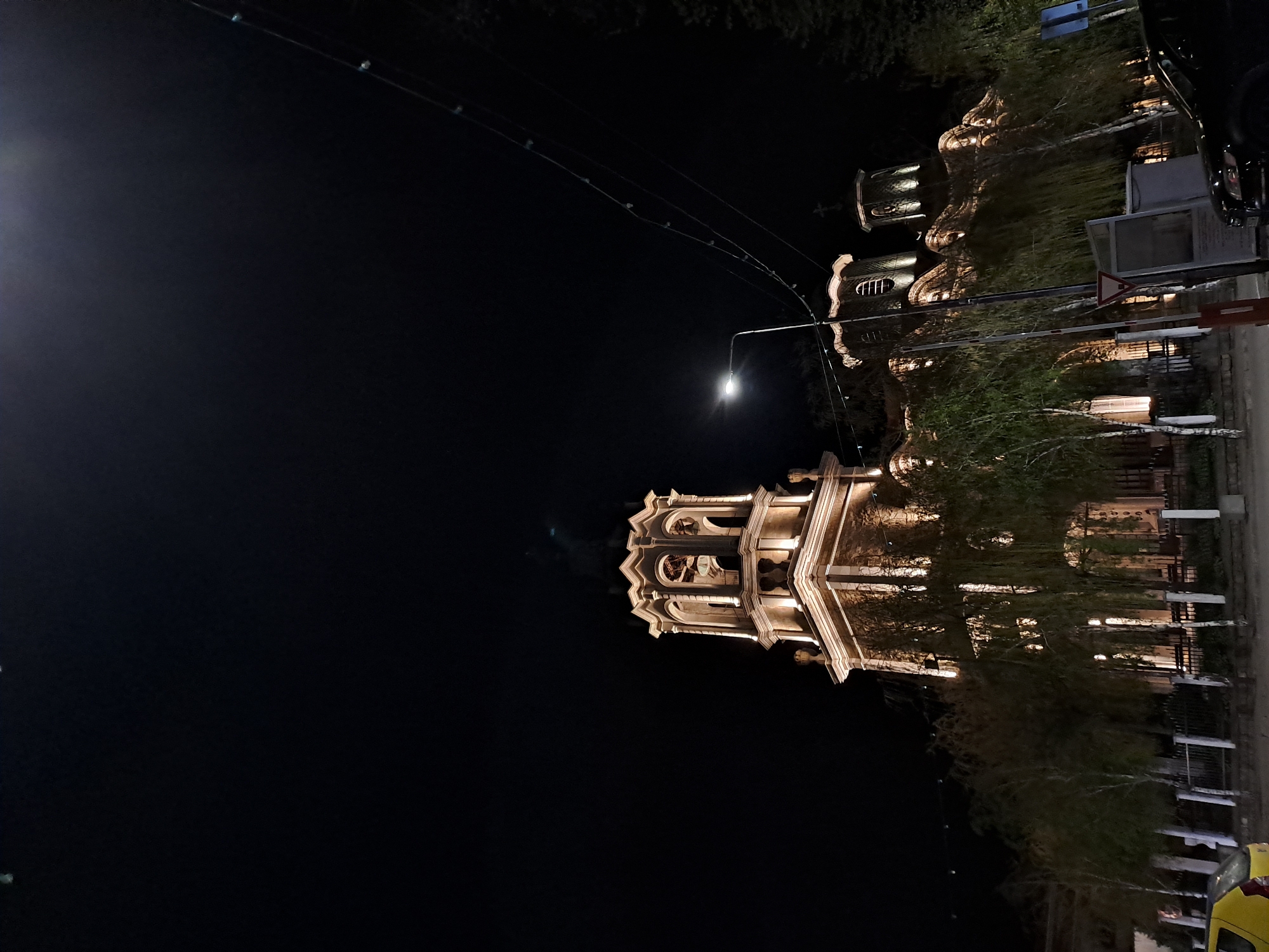 Nighttime urban monuments and illuminated buildings observed April 9