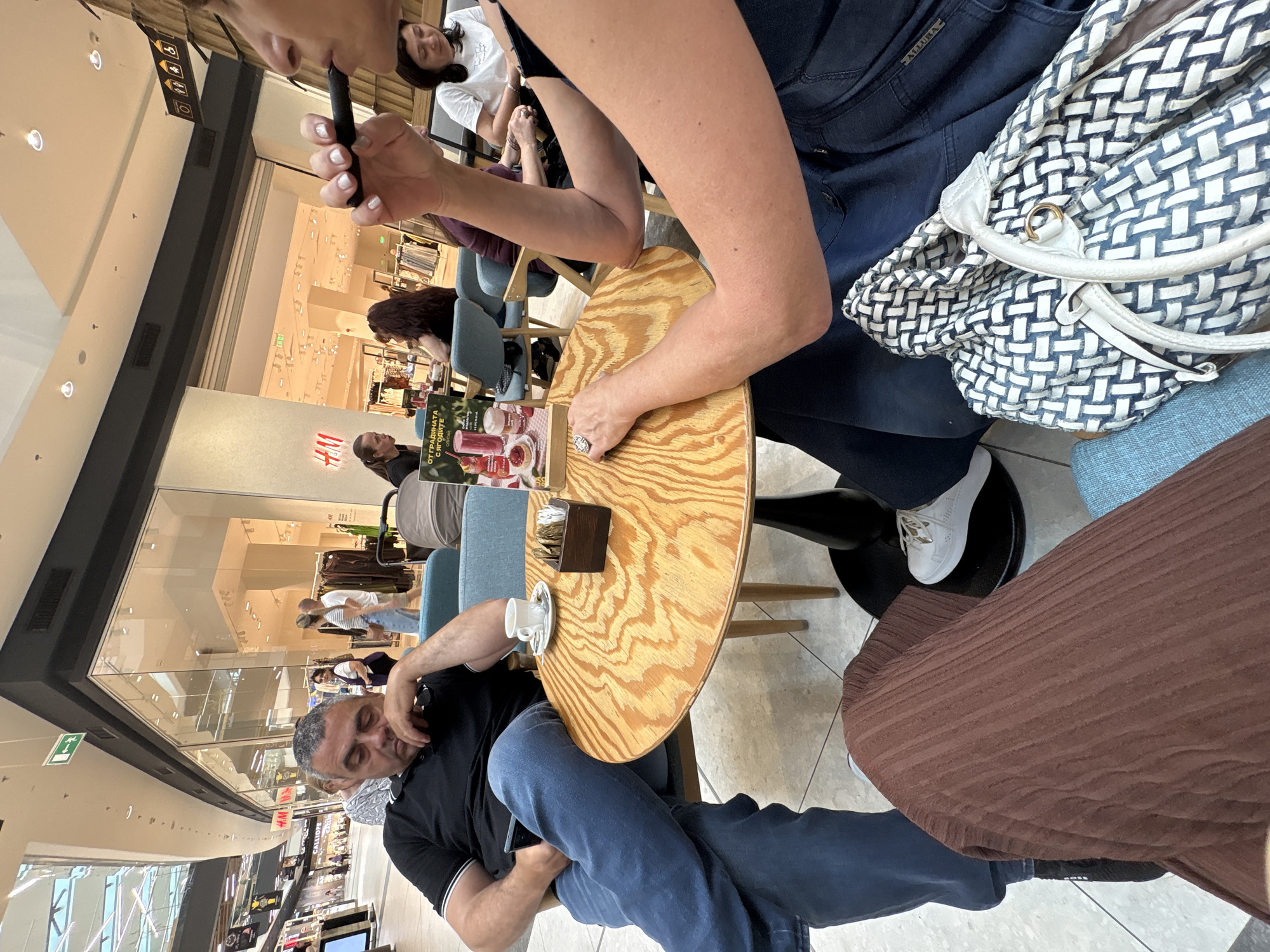 Cafe visit documented through selfies and food photos in Burgas