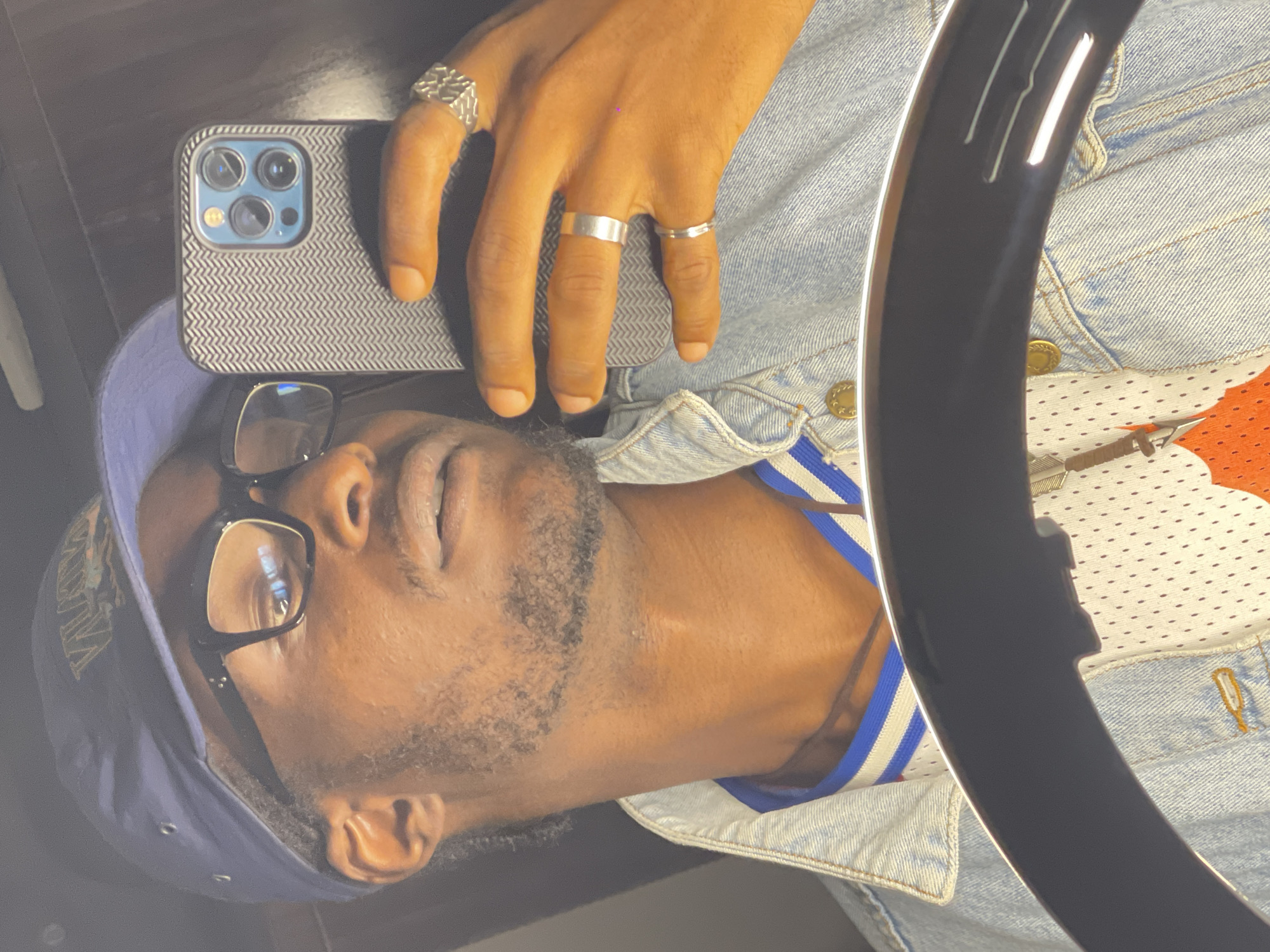 Abuja OOTD selfie set: denim jacket, cap, and rings
