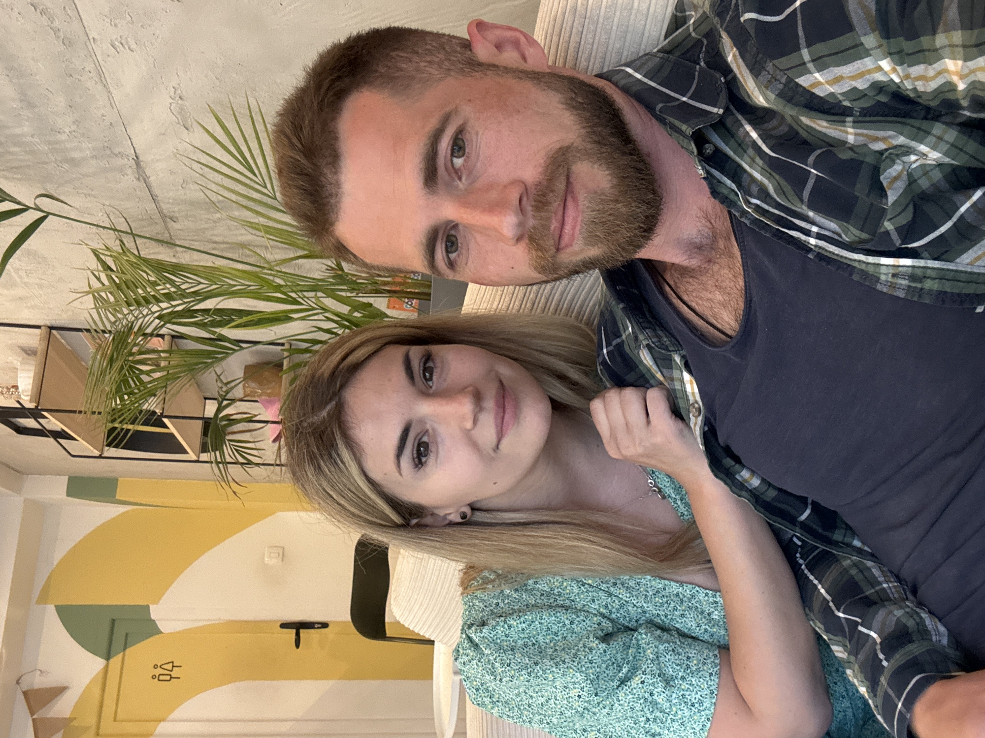 Couple captured in casual indoor moments in Budva